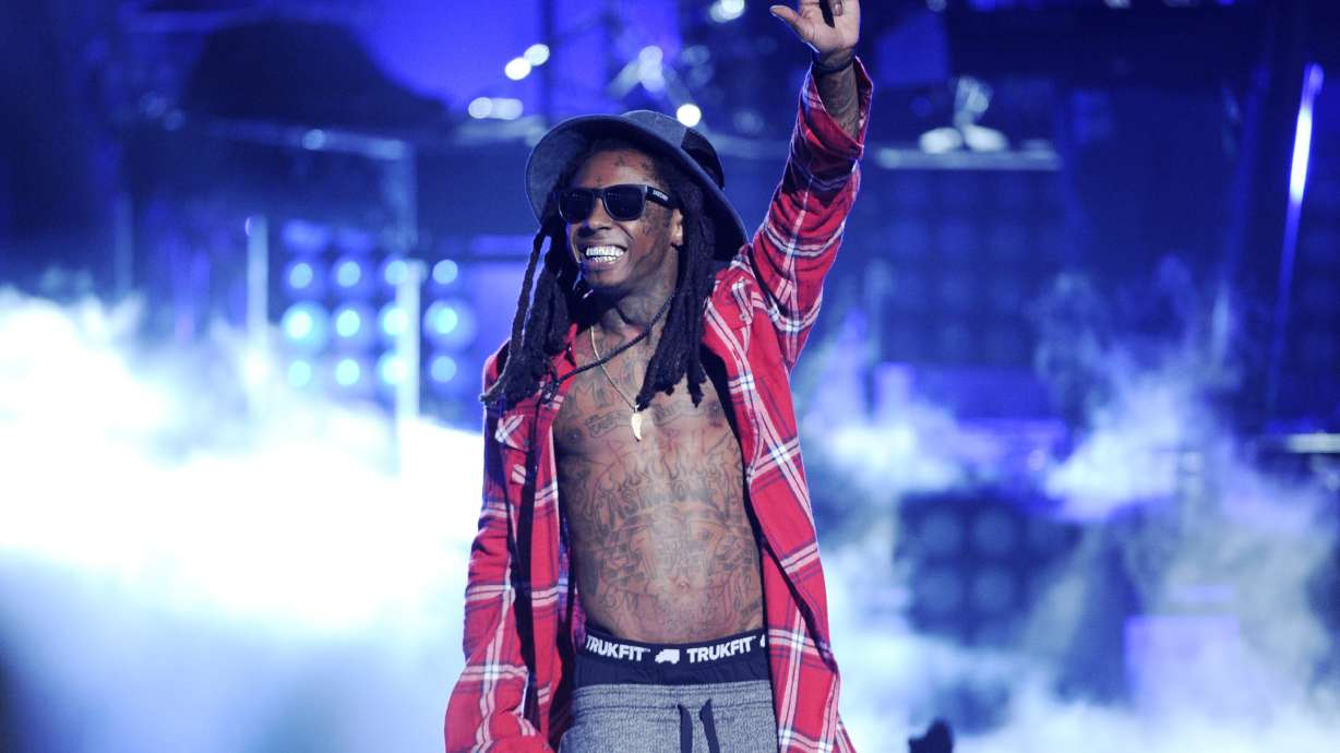Atlanta man surrenders in shooting of Lil Wayne's tour bus