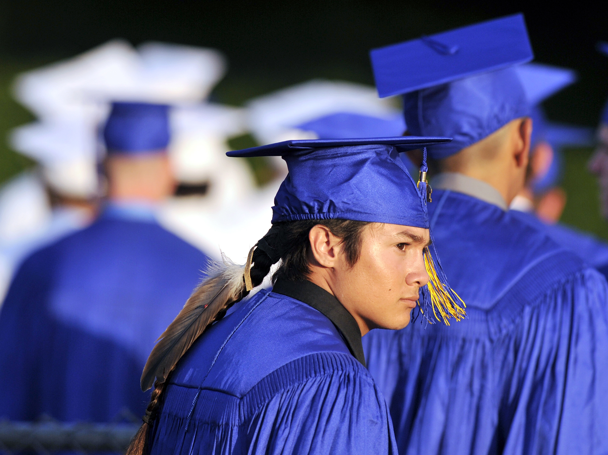 Student wears eagle feather at graduation after lawsuit