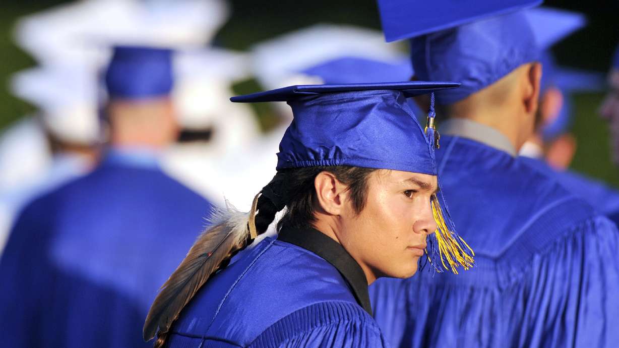Student wears eagle feather at graduation after lawsuit