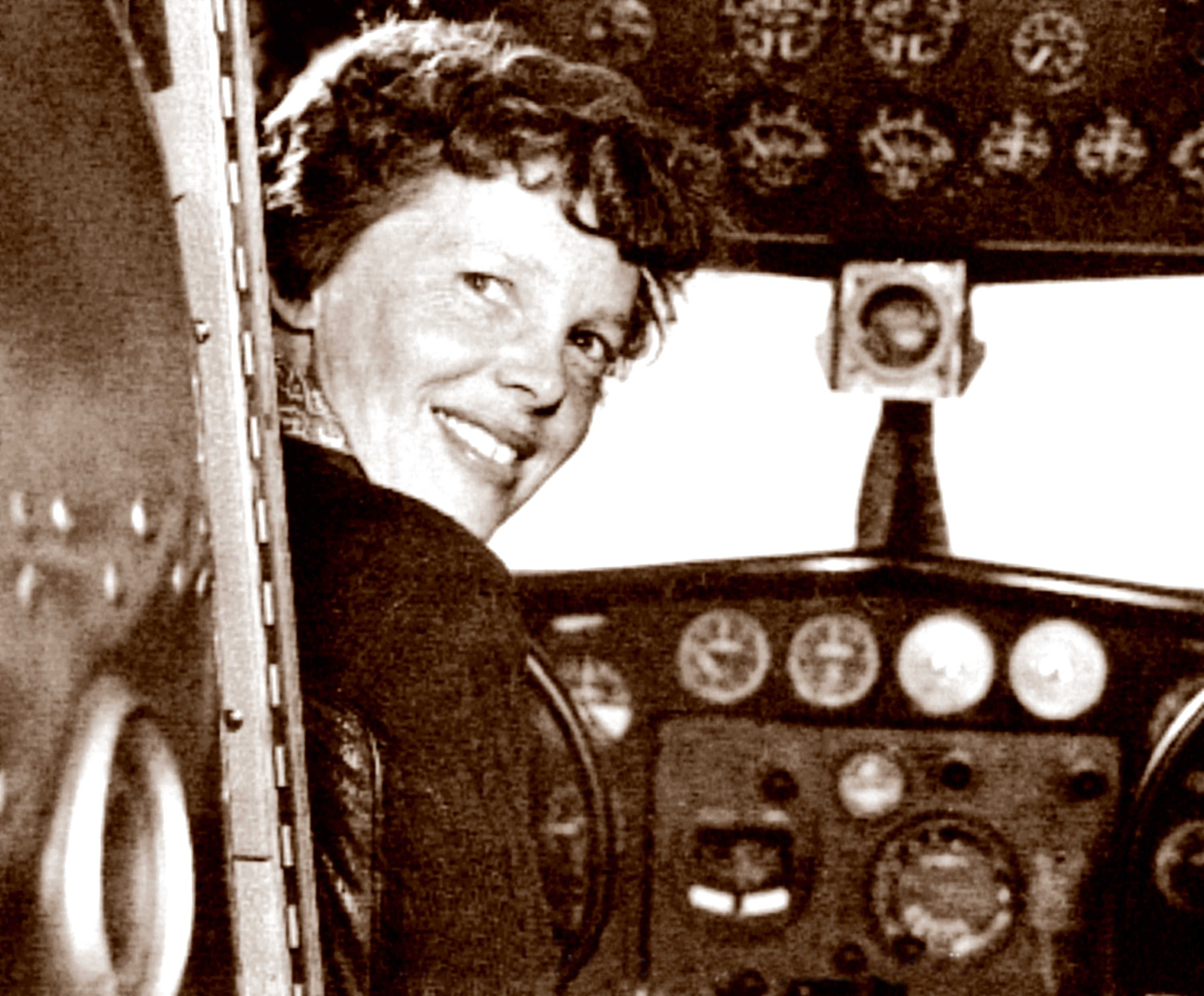 In this May 20, 1937 photo, provided by The Paragon Agency, shows aviator Amelia Earhart at her Electra plane cabin, taken by Albert Bresnik at Burbank Airport in Burbank, Calif. Photo: AP Photo