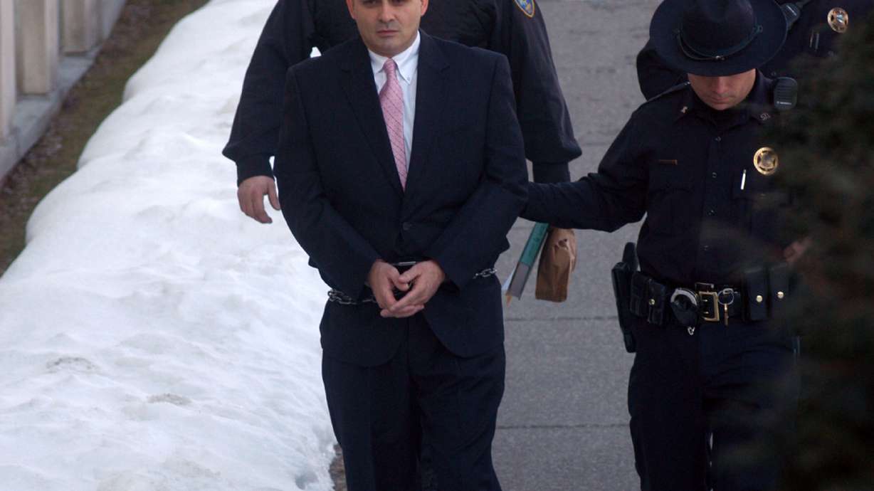 Hunt for killers expands to Vermont; staffer under suspicion