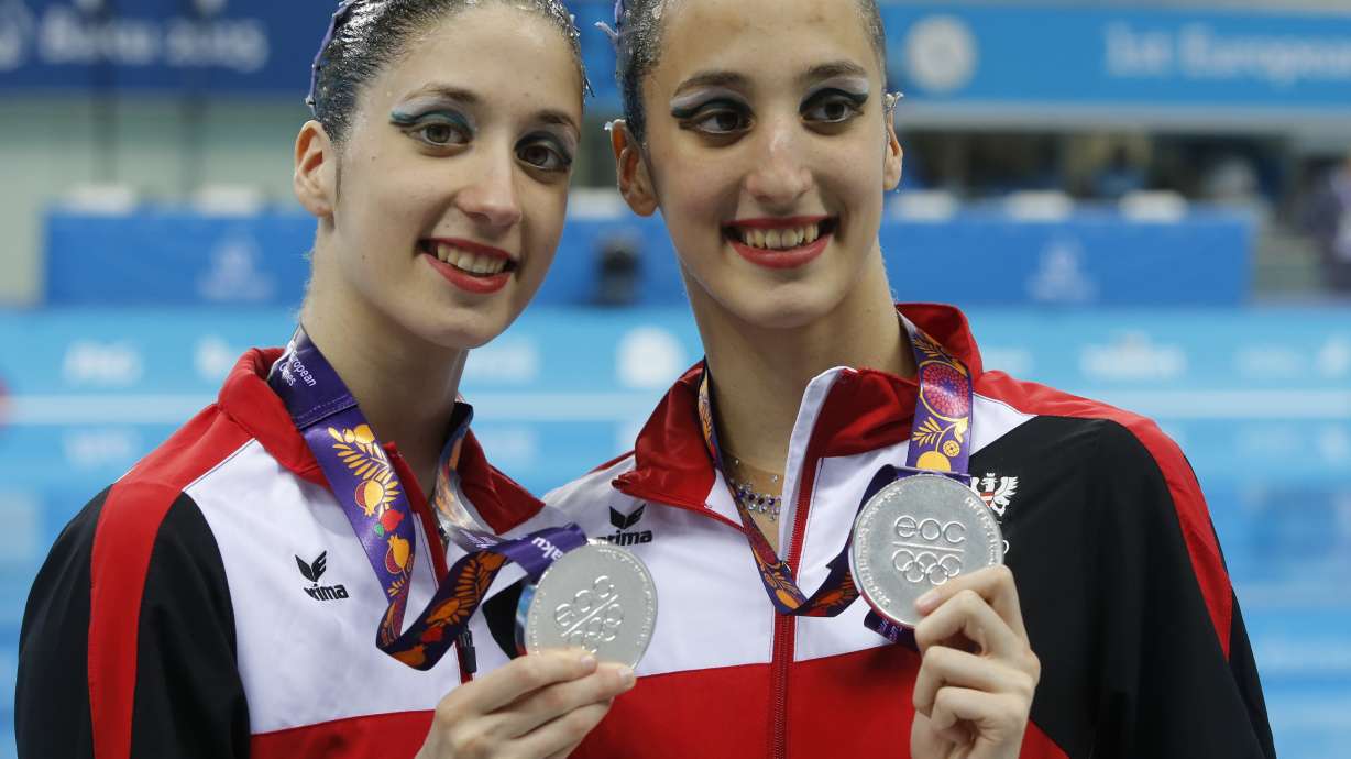 Austrian swimmers win medal after bus crash