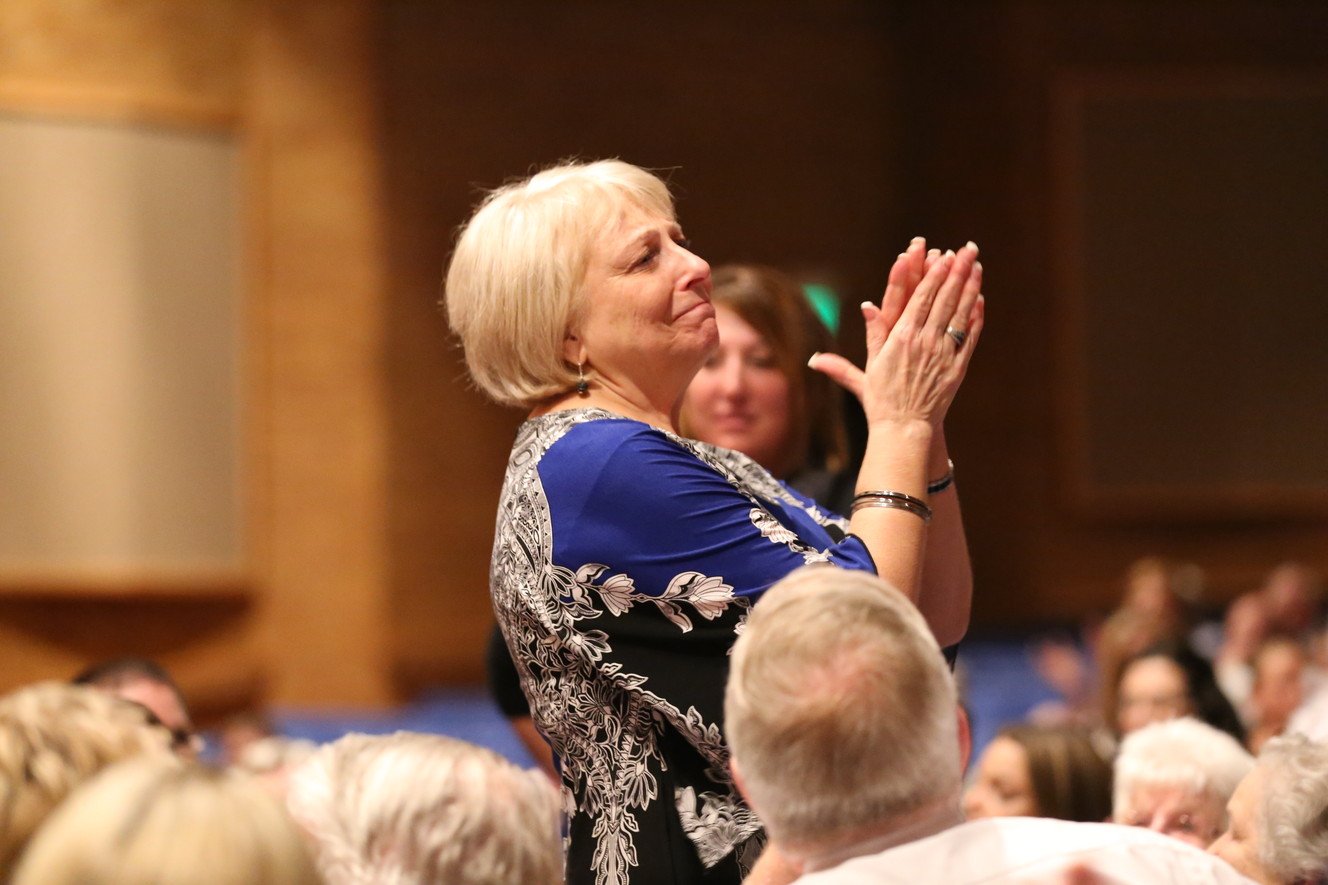 Students, alumni surprise retired drama teacher with performance