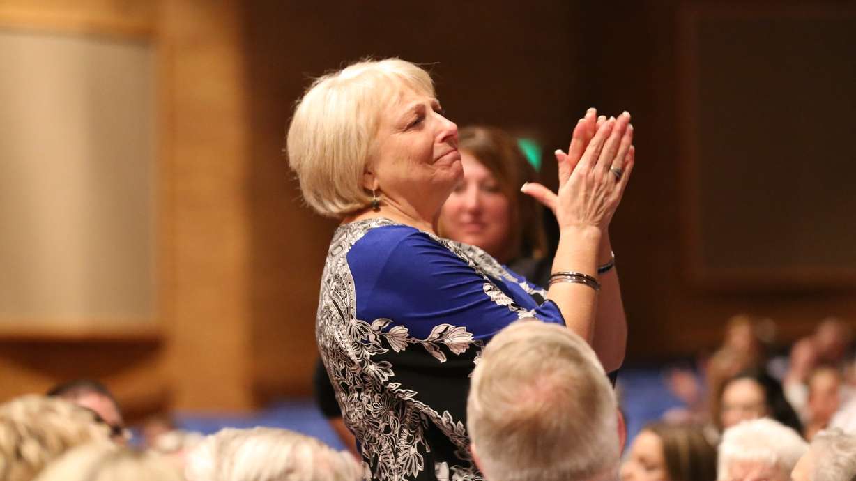 Students, alumni surprise retired drama teacher with performance