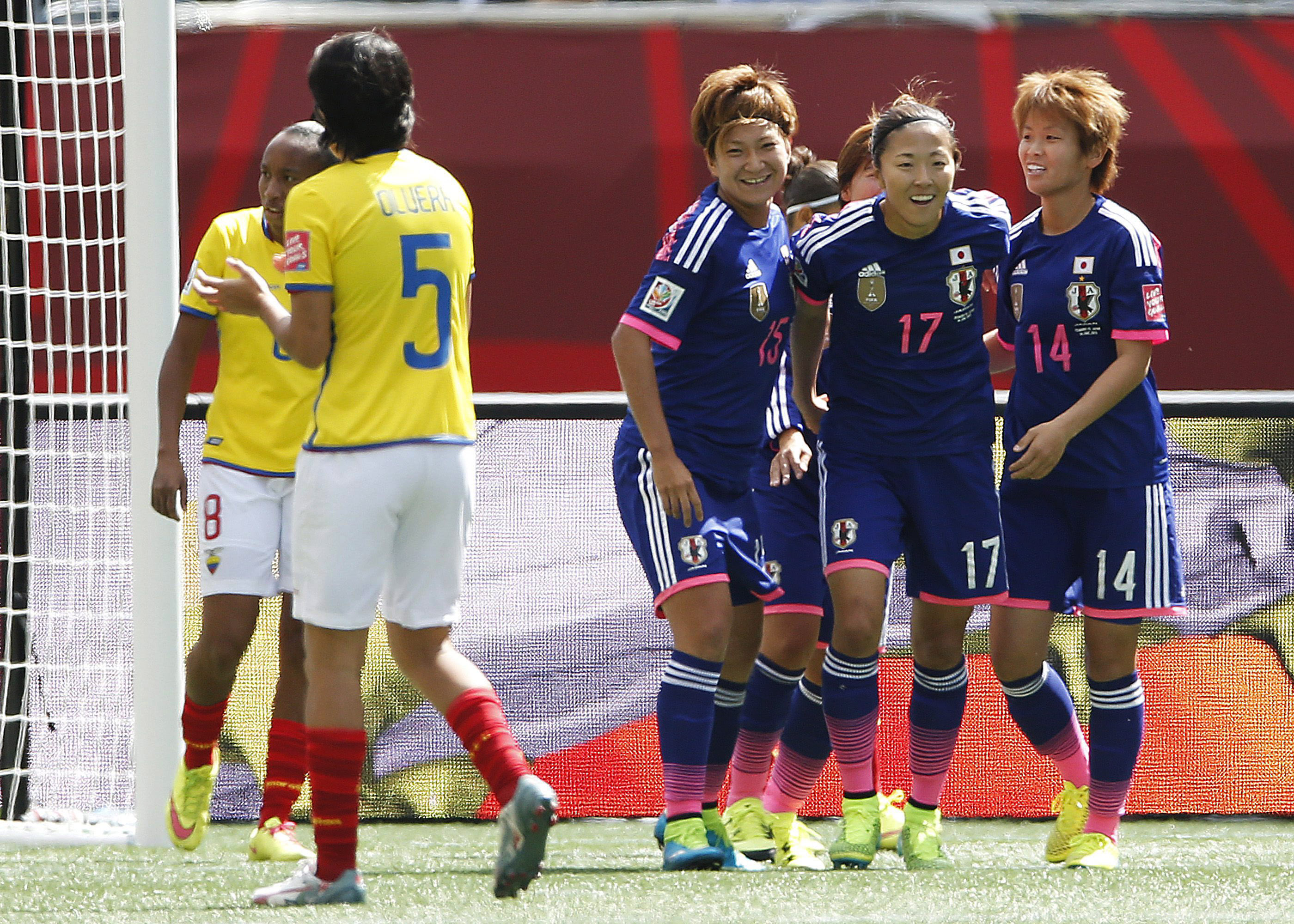 Japan beats Ecuador 1-0, tops group with perfect record