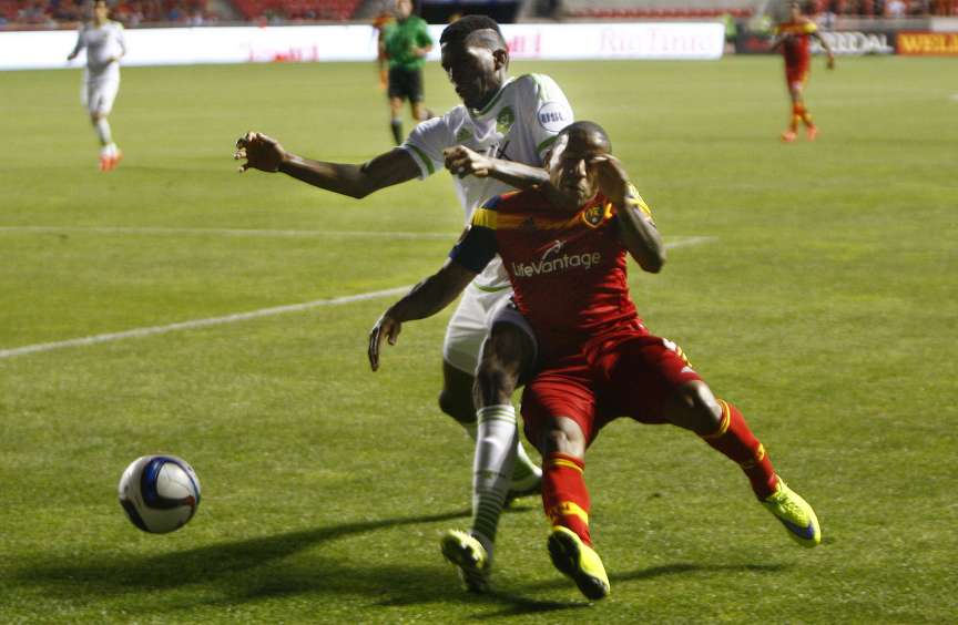 Real Salt Lake forward Joao Plata (8) tussles for the ball with Sounders 2 defender Damion Lowe (31) in the fourth round of the Lamar Hunt U.S. Open Cup at Rio Tinto Stadium in Sandy, Tuesday, June 16, 2015. RSL won the game, 2-1. (Chris Samuels/Deseret News)