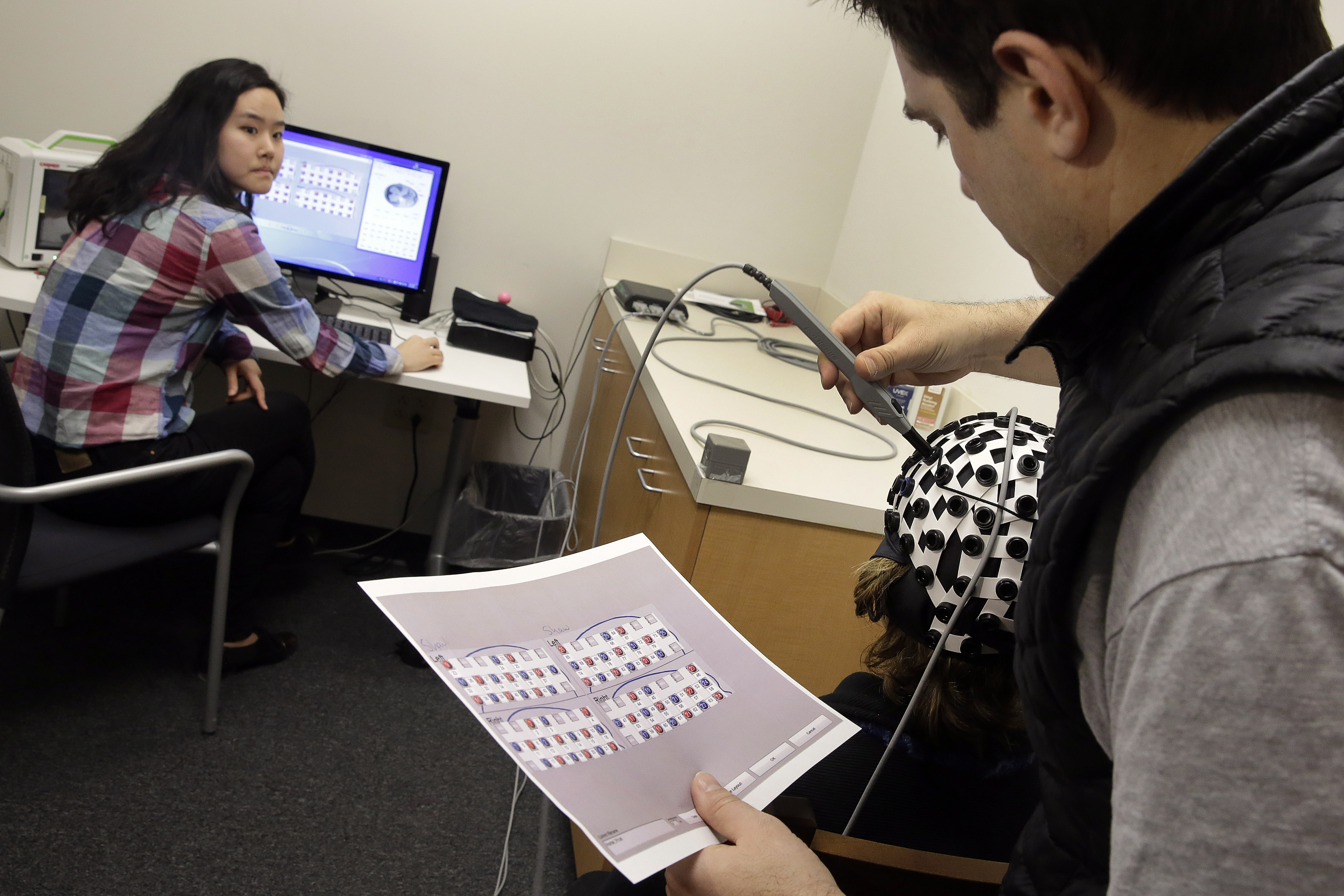 Lasers, magnetism allow glimpses of the human brain at work