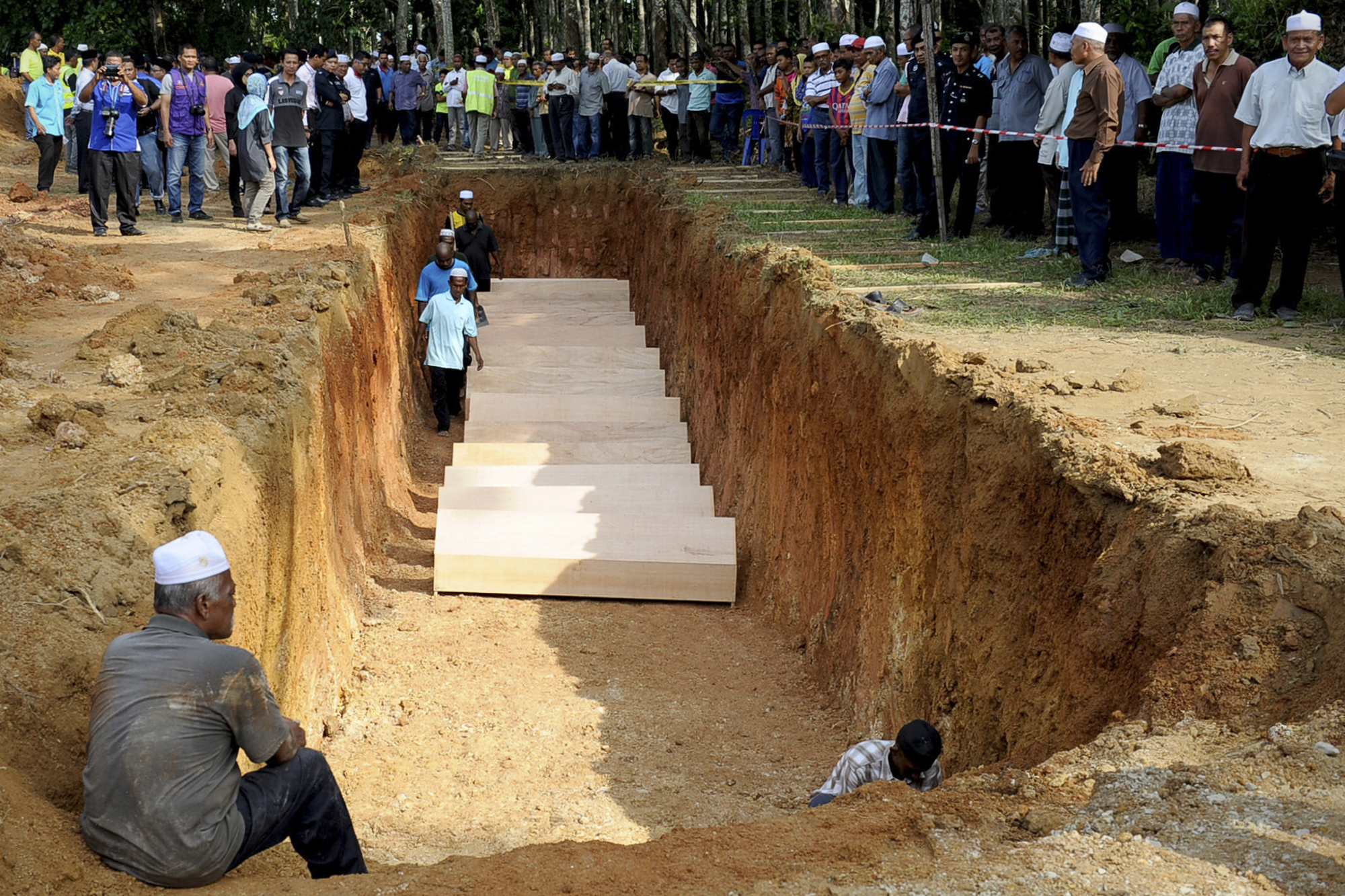 Malaysia buries Rohingya human-trafficking victims