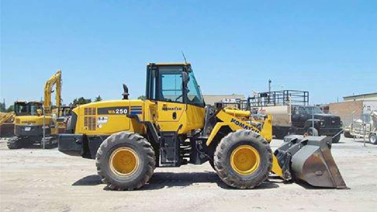 Detectives find stolen loader abandoned in church parking lot