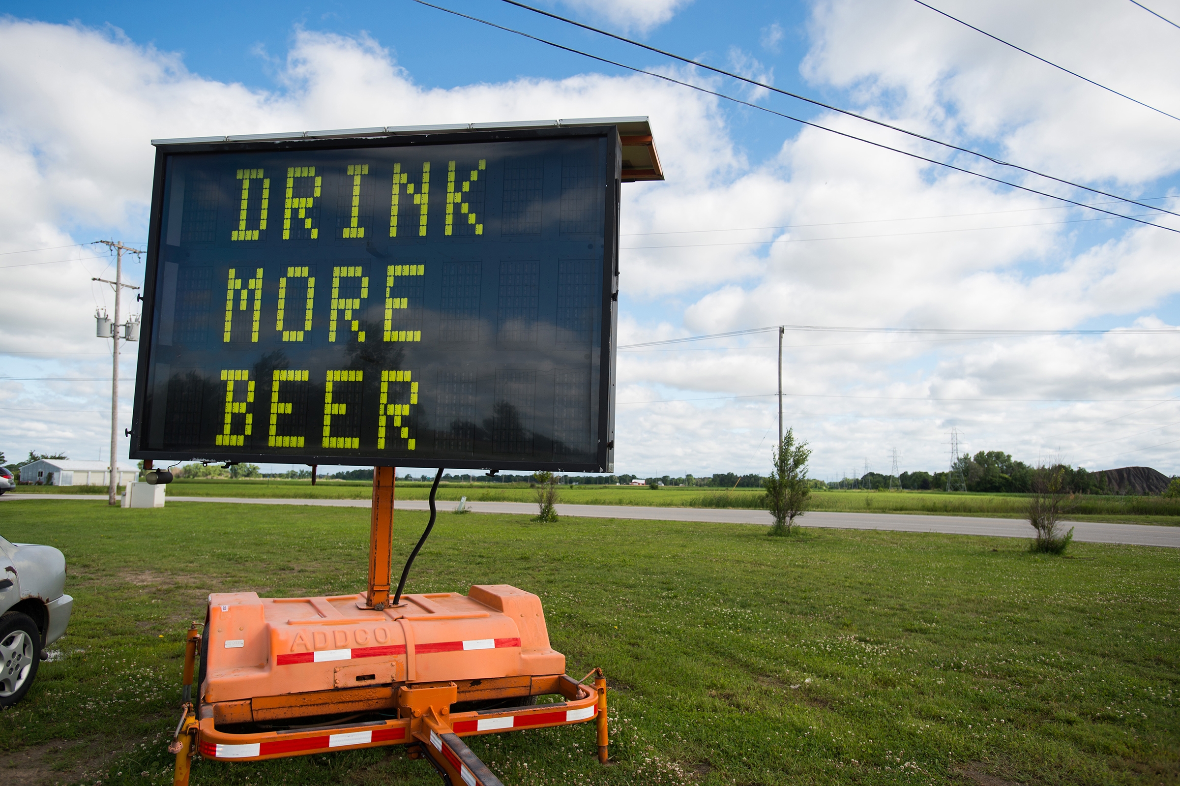 Road sign advising to 'drink more beer' sells for $600