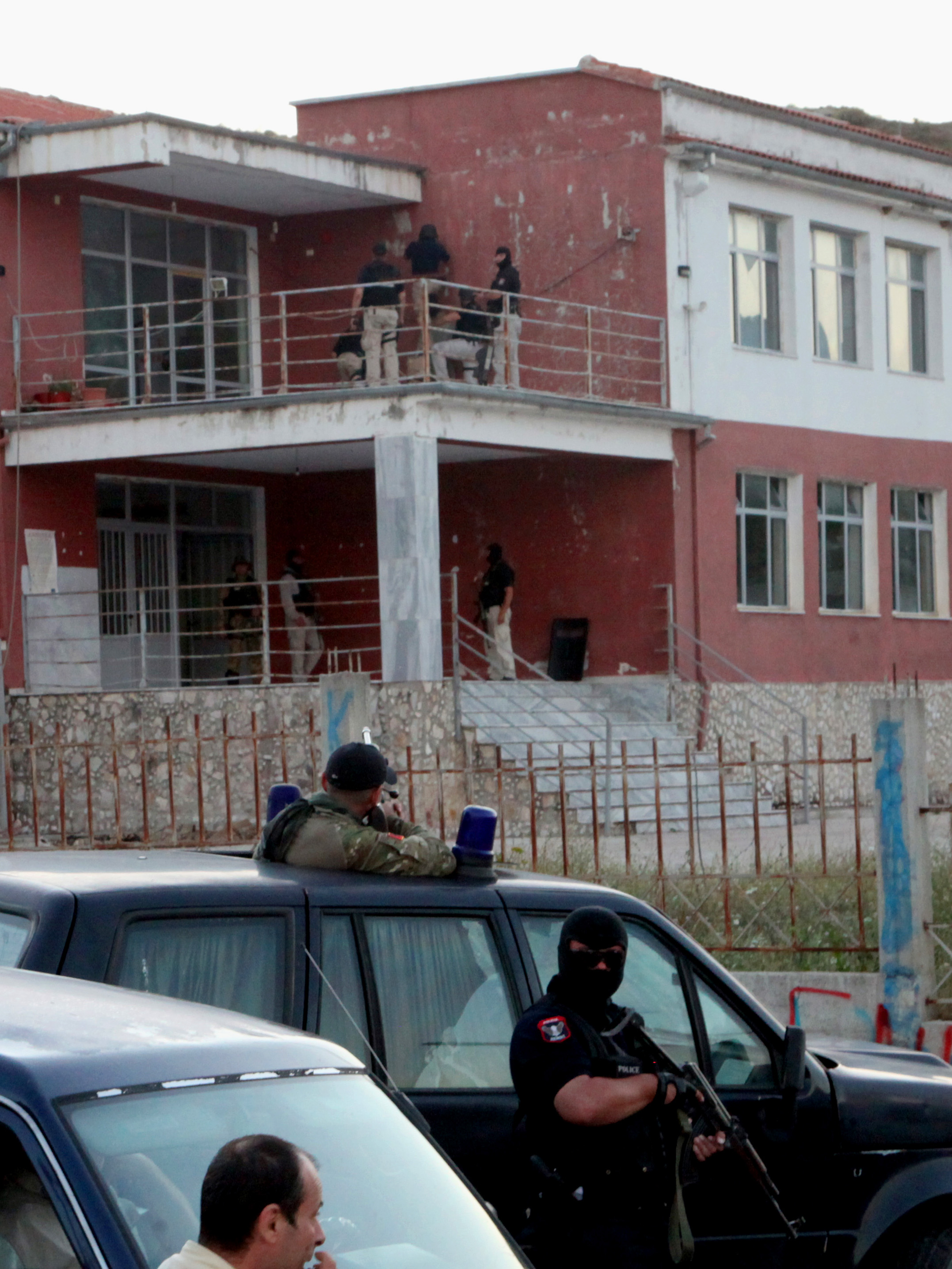 Albania police arrest 2 more suspects in policeman's slaying