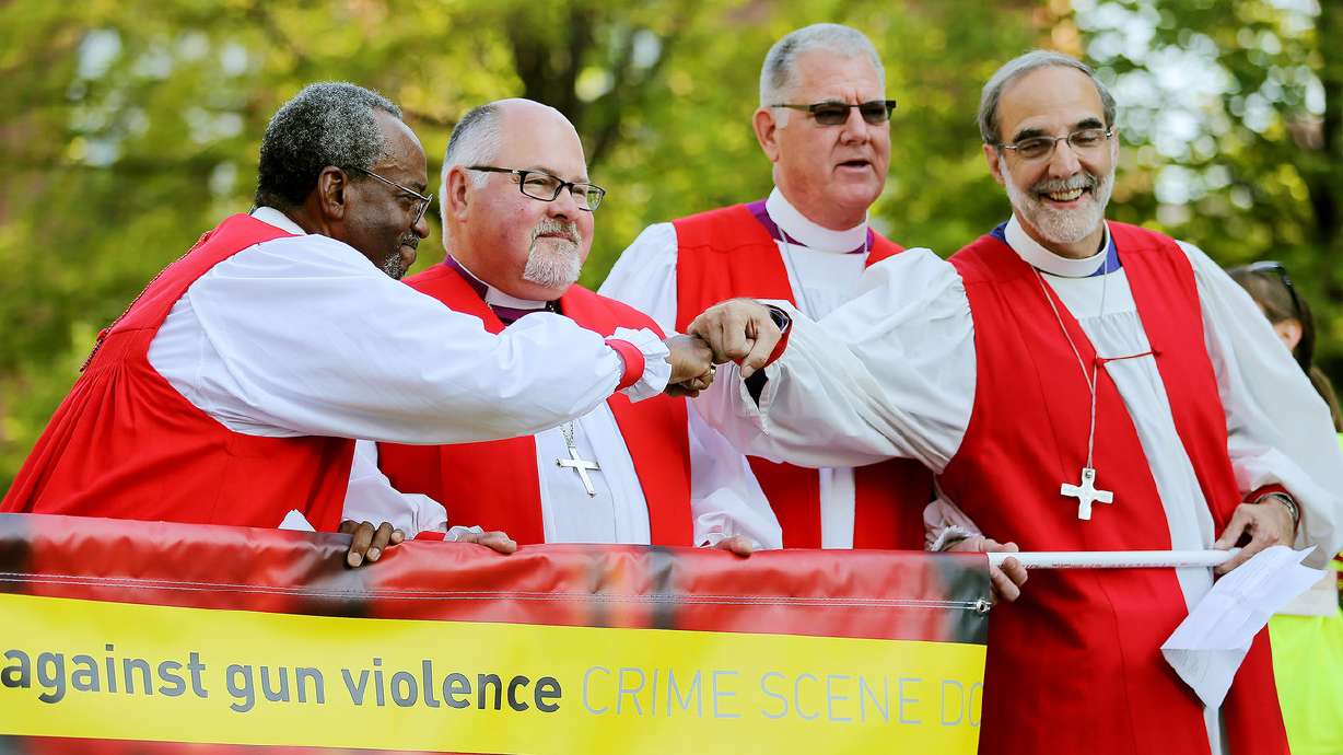 Episcopal bishops march to end 'unholy trinity' of racism, poverty, gun violence
