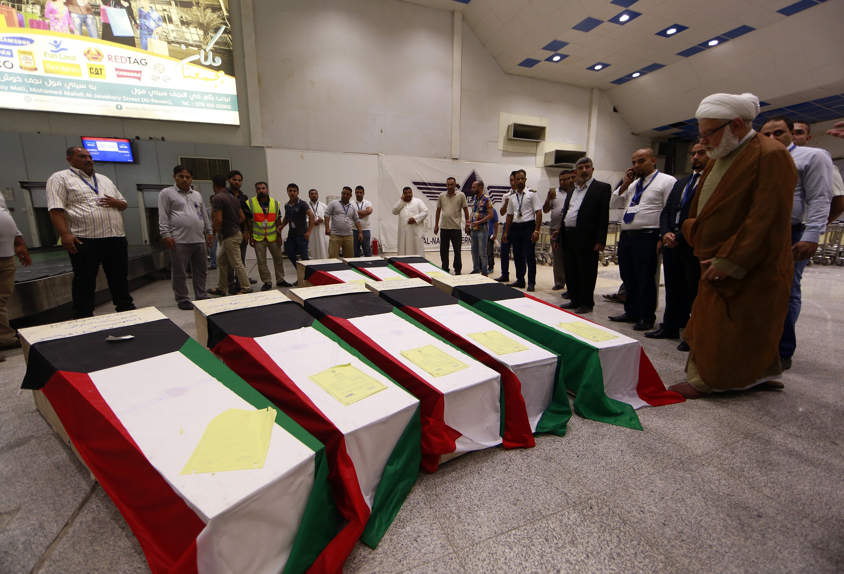 Kuwait mosque bomber raised no red flags, transited Bahrain