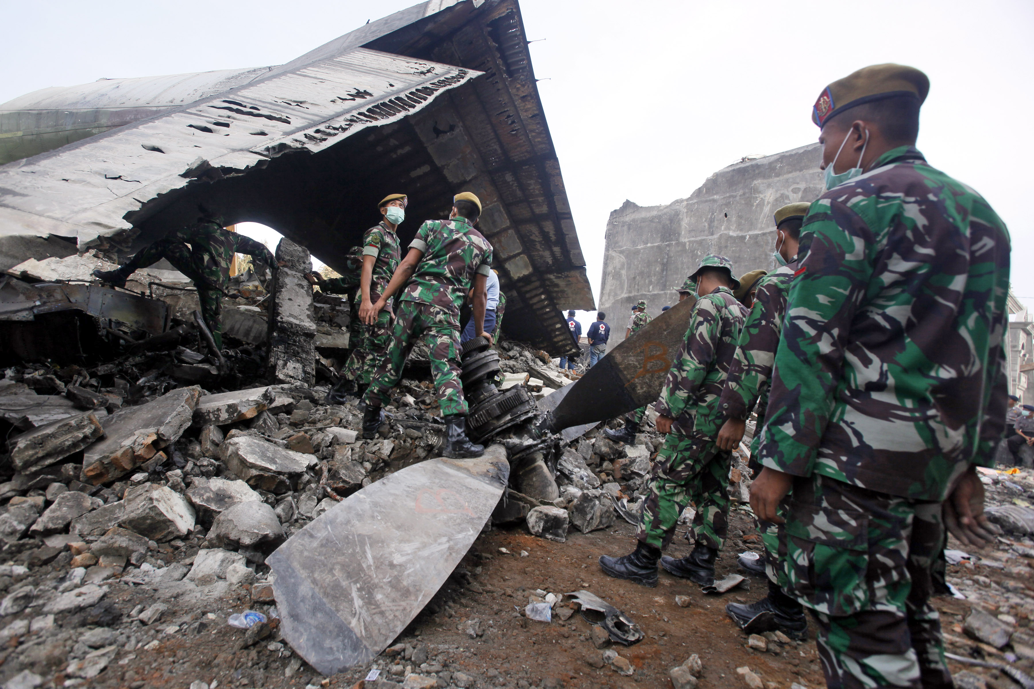 The Latest on Indonesia: Search for plane crash victims ends