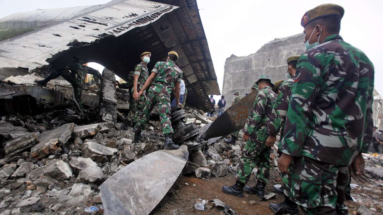 The Latest on Indonesia: Search for plane crash victims ends