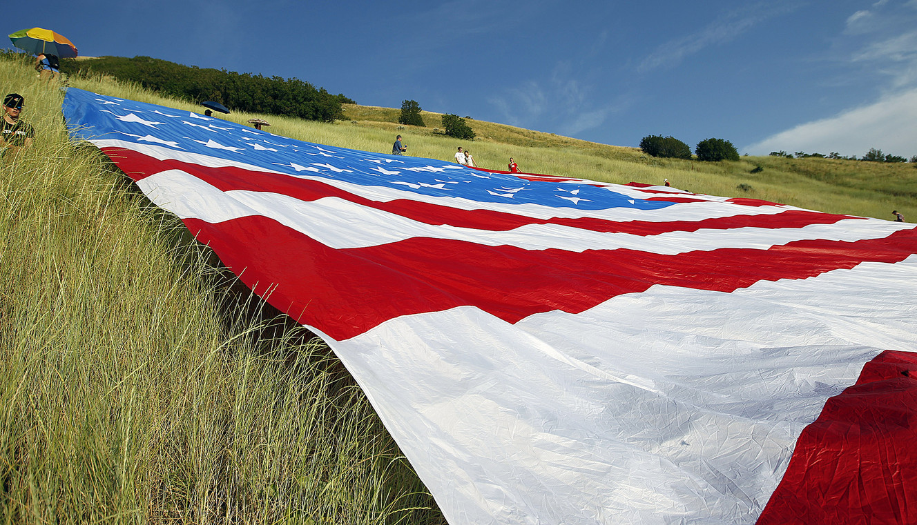 Gigantic flag is backdrop for Centerville's centennial celebration