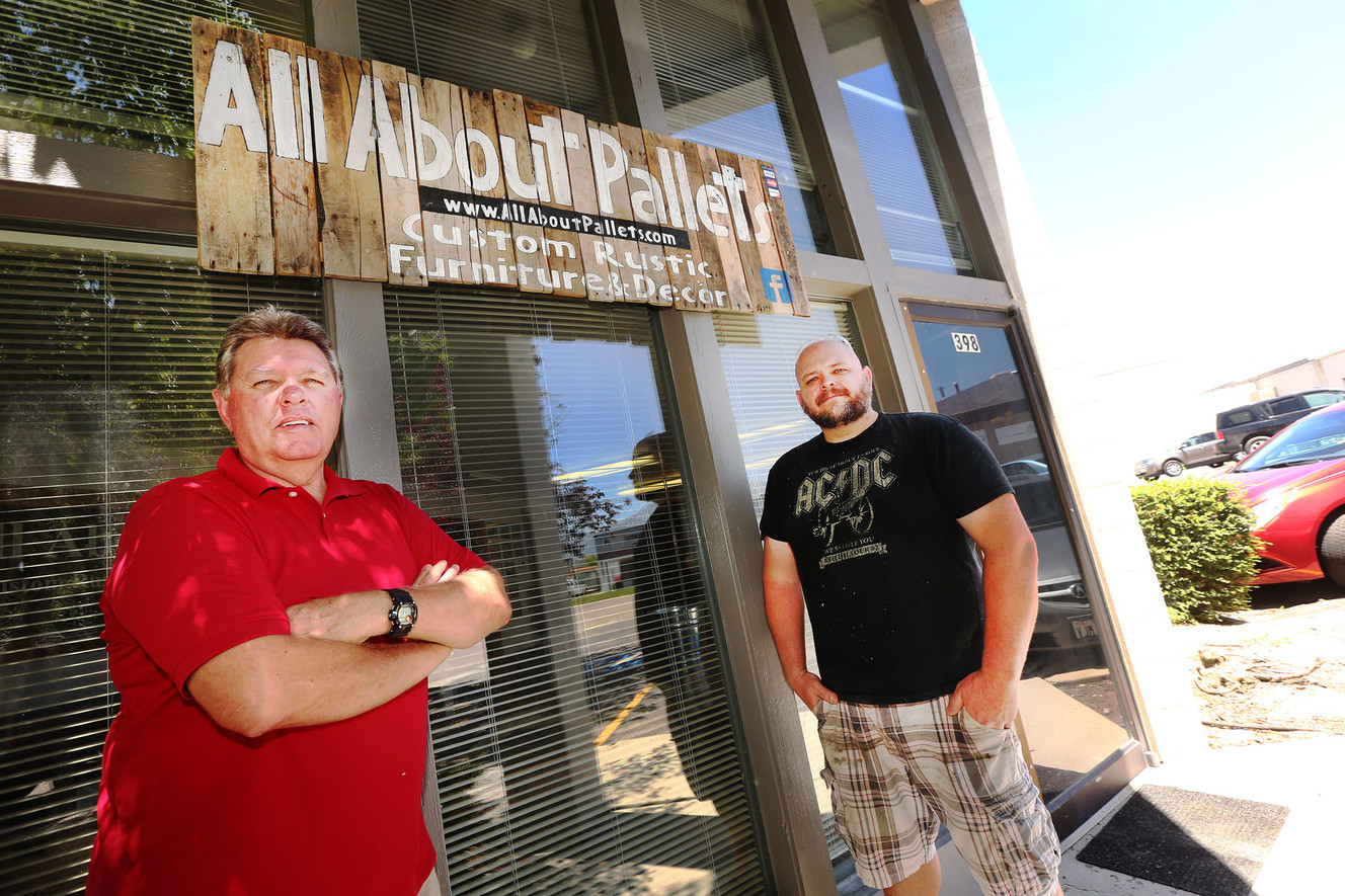 Matt Willahan, right, and his dad Bill at their store All About Pallets in Murray, Friday, June 26, 2015. Photo: Scott G Winterton/Deseret News