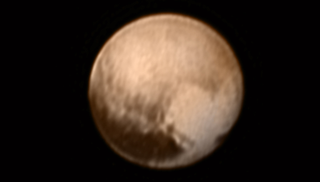 This image received on July 8, 2015 and made available by NASA/Johns Hopkins University Applied Physics Laboratory/Southwest Research Institute shows Pluto from the New Horizonsâ&#x20AC;&#x2122; Long Range Reconnaissance Imager (LORRI) combined with lower-resolution color information from the spacecraft's Ralph instrument. (NASA/JHUAPL/SWRI via AP)