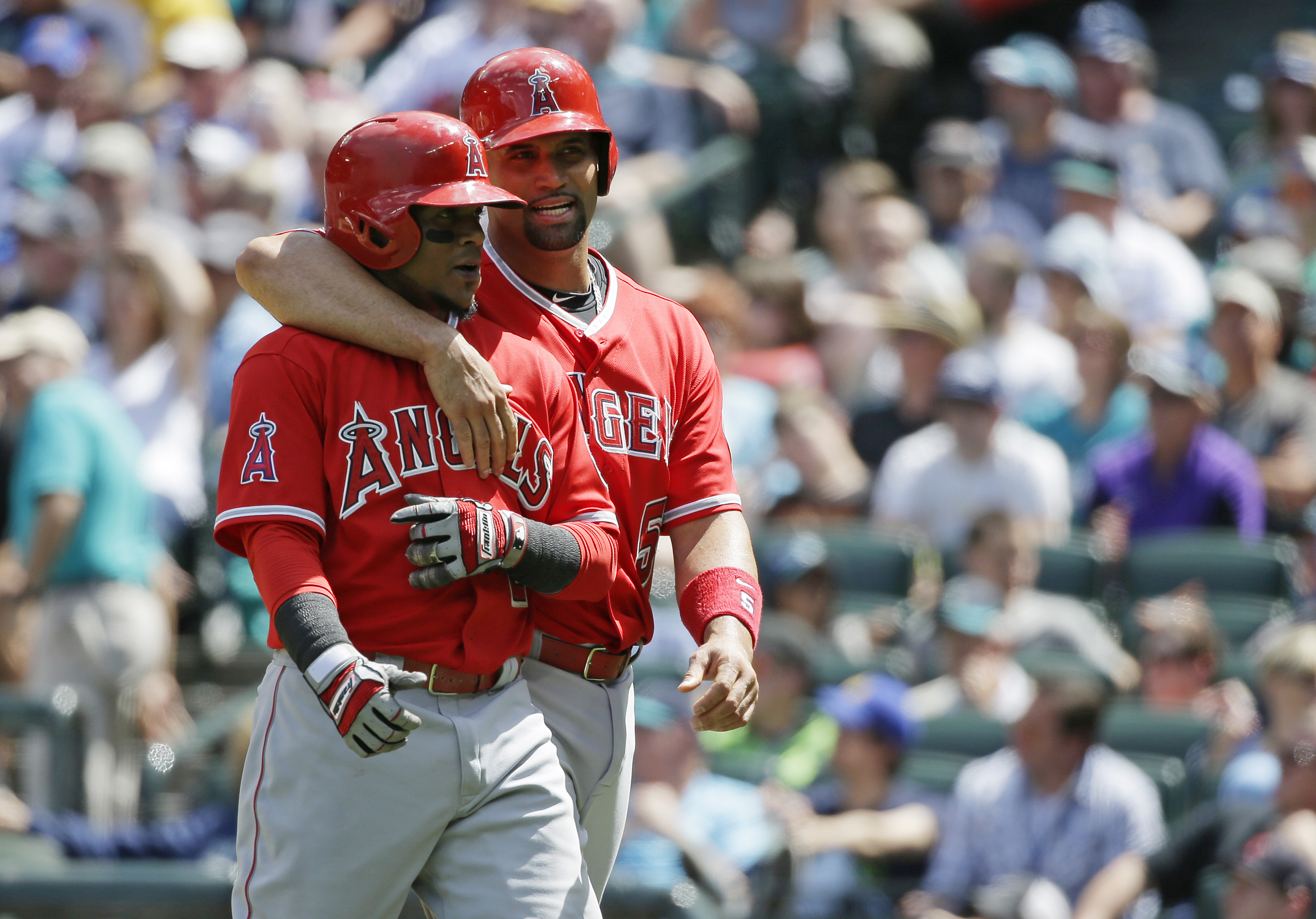 Angels move into 1st place in AL West, beat Seattle 10-3