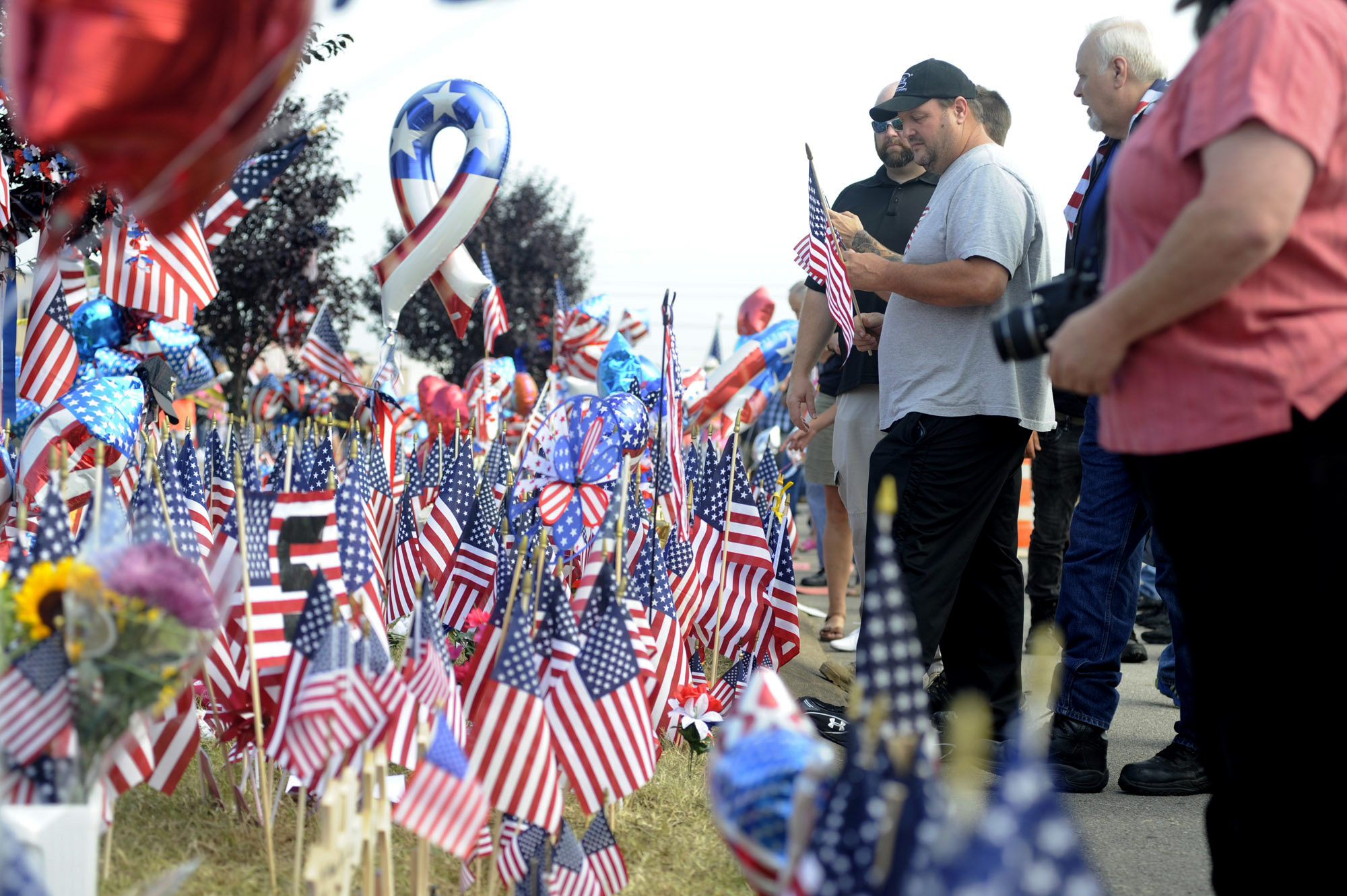 The Latest: Memorial held for slain Marine outside Atlanta