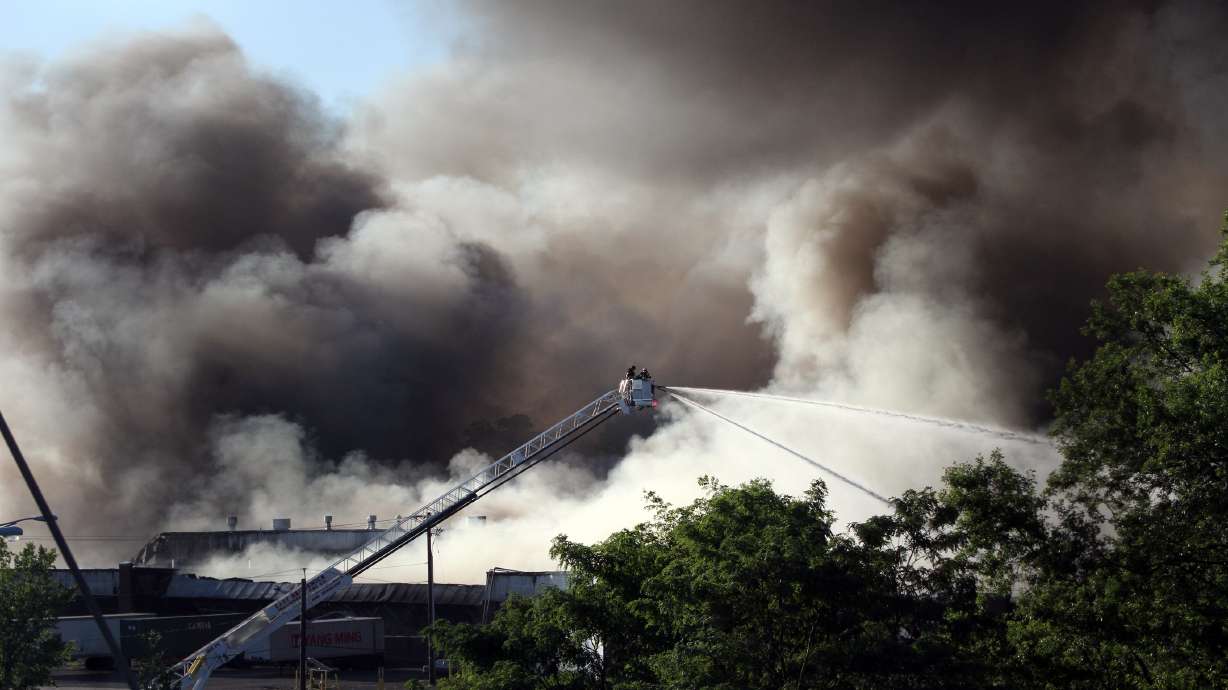 Residents evacuated by huge warehouse fire can return home
