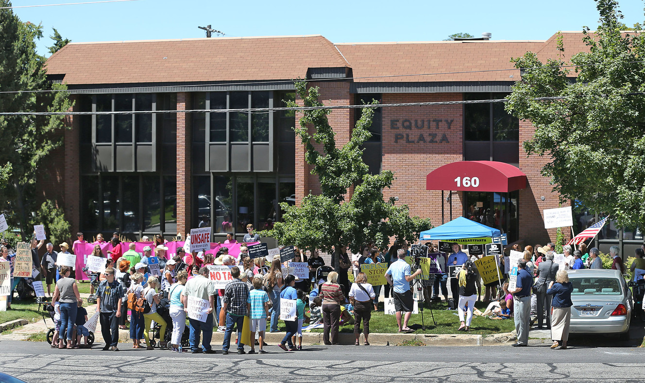 A group called Women Betrayed holds a rally to support ending taxpayer funding of Planned Parenthood in front of the Planned Parenthood offices, July 28, 2015, in Salt Lake City. (Photo: Tom Smart/Deseret News)