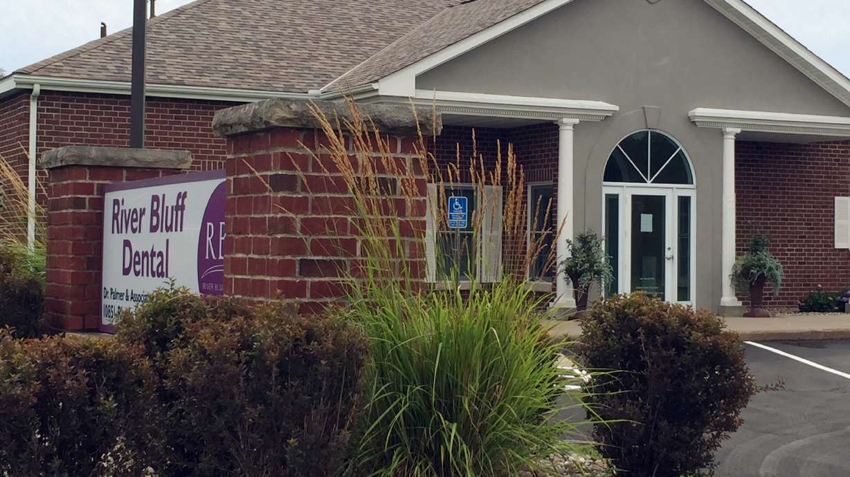 The Latest: Hundreds protest lion killing at dentist office