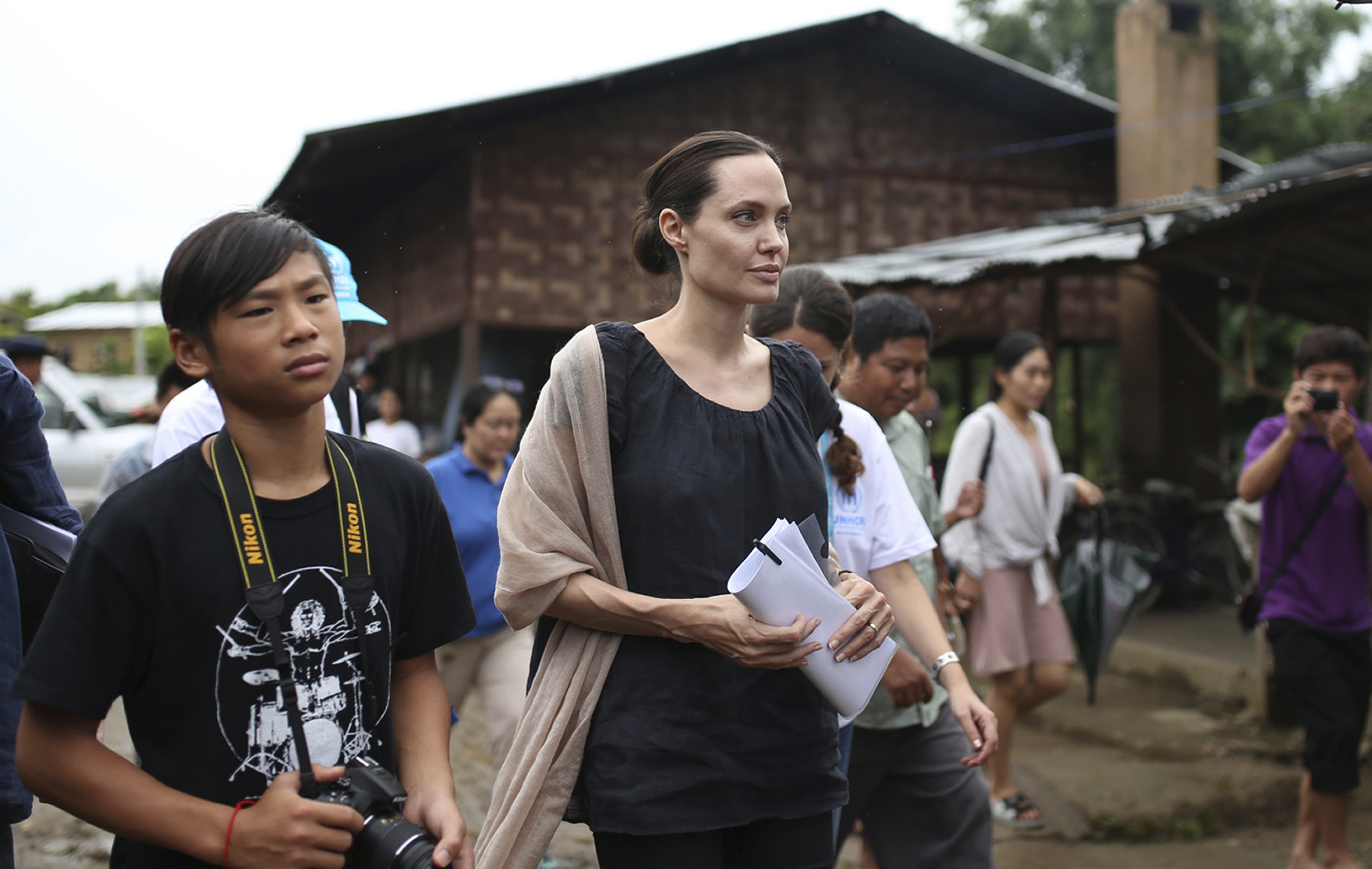 Jolie, Suu Kyi visit Myanmar female factory workers