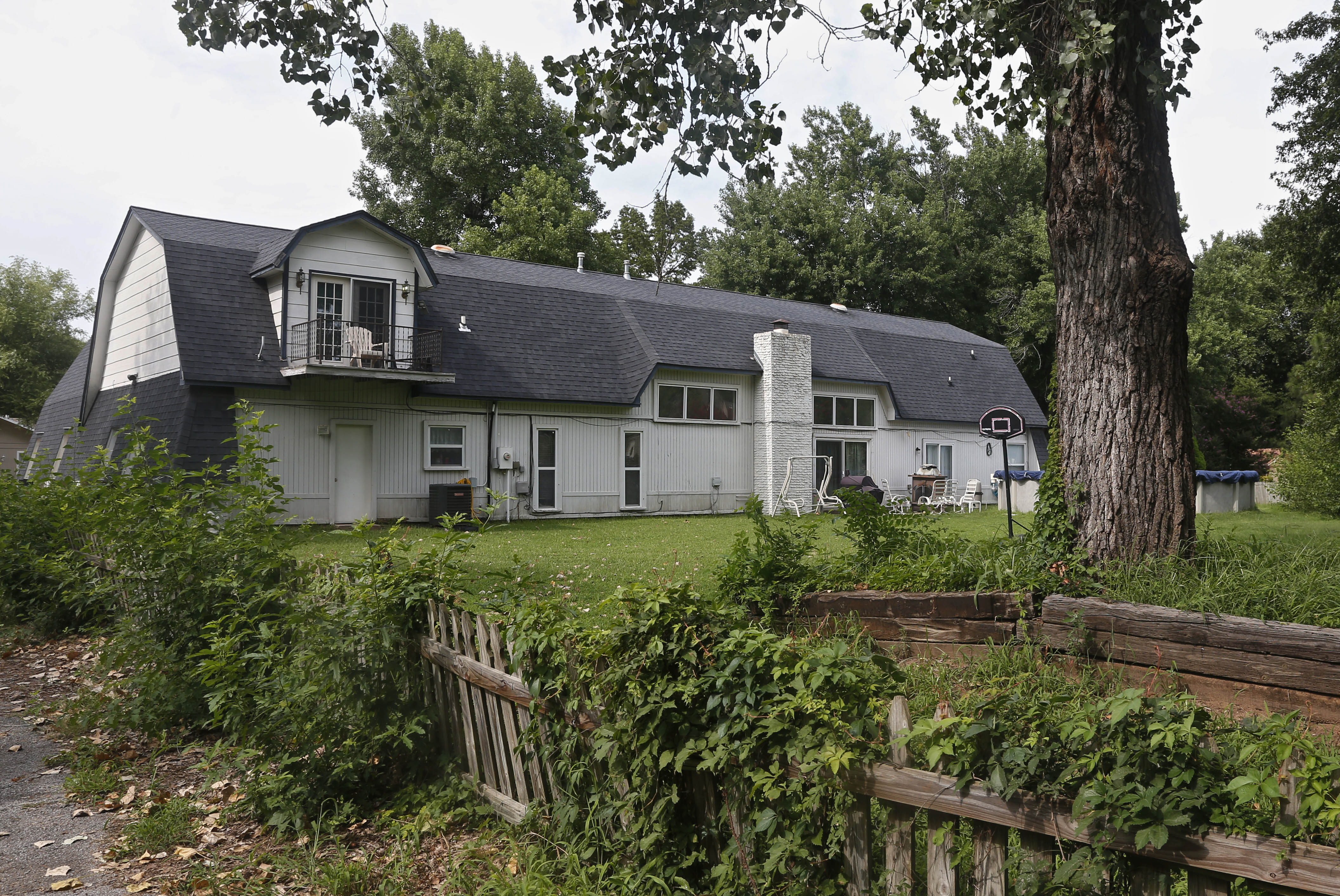 Oklahoma suburb searching for answers after fatal stabbings