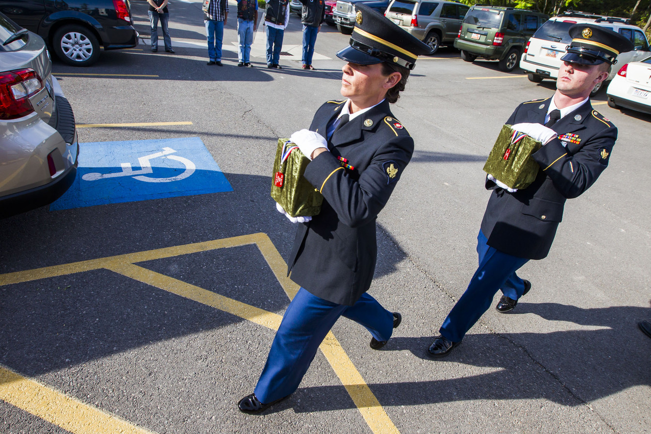 Members of the U.S. Army Honor Guard carry unclaimed cremated remains of veterans into the chapel for a ceremony to honor and inter them at Utah Veterans Memorial Park on Saturday, Aug. 1, 2015 in Bluffdale. (Photo: Stacie Scott, Deseret News)