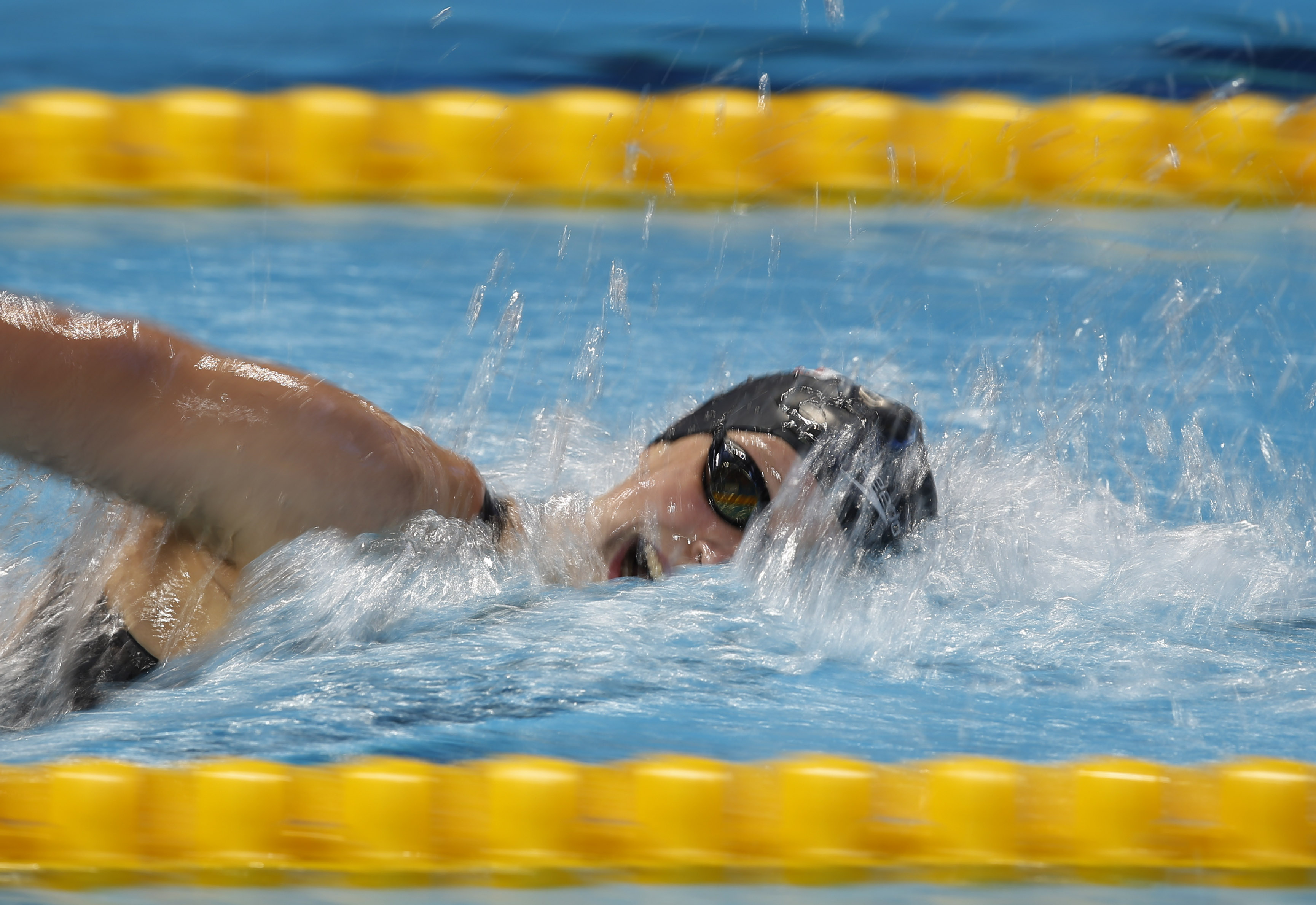 American Katie Ledecky lowers own world mark in 1,500 free