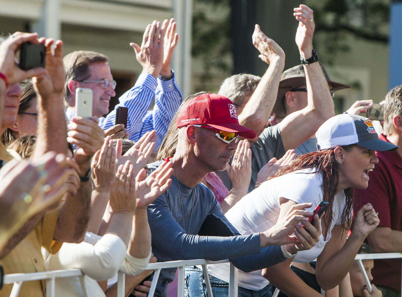 Bambi Sevy, from Las Vegas, watches as Tour of Utah cyclists compete in the Stage 5 Salt Lake City Circuit on Friday, Aug. 7, 2015. (Photo: Stacie Scott, Deseret News)