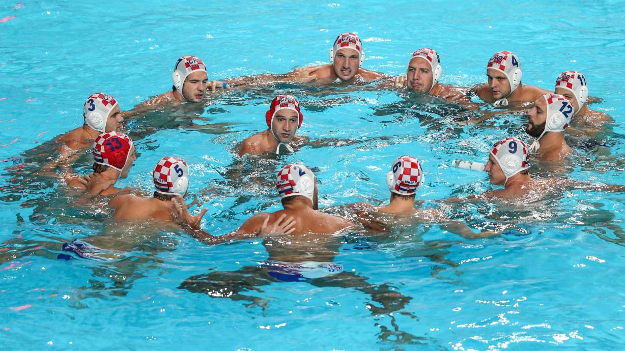 Serbia pounds Croatia to win world water polo championship