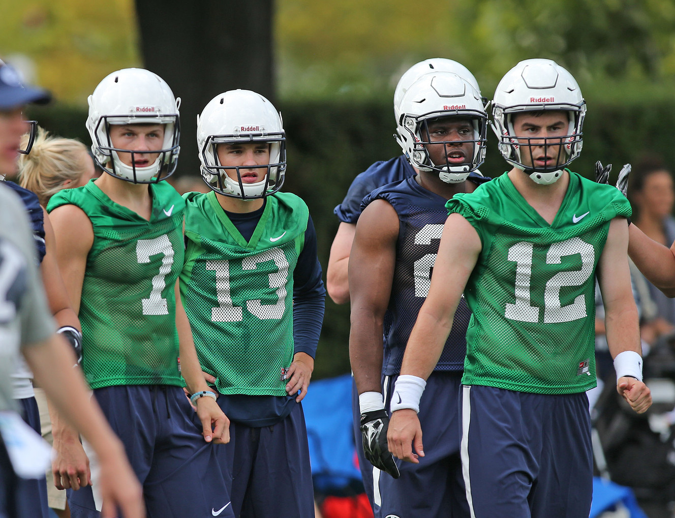 Backup quarterbacks Beau Hoge, 7, Koy Detmer Jr., 13, and Tanner Mangum, 12, as BYU opens their first day of football camp Aug. 8, 2015, in Provo. (Photo: Tom Smart, Deseret News)