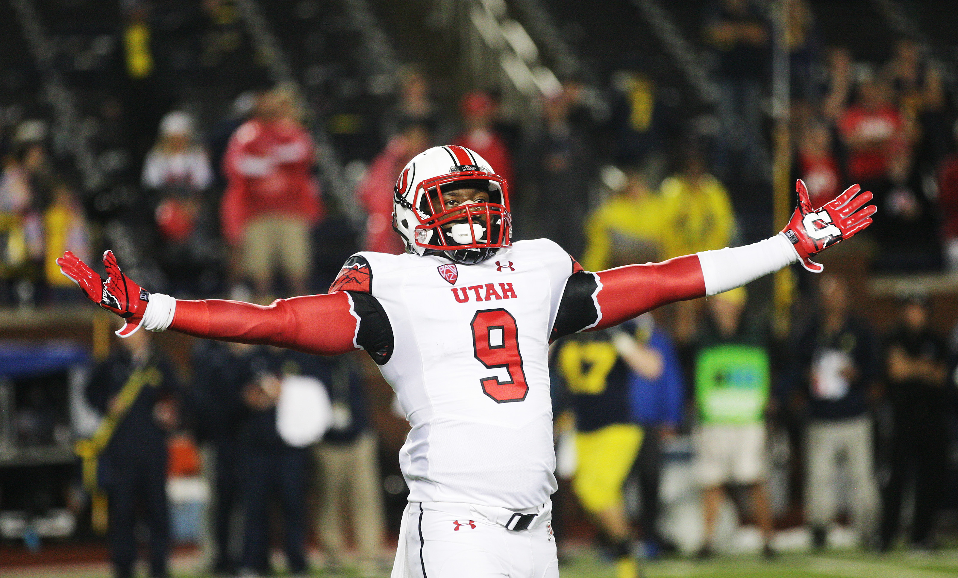 Utah Utes defensive back Tevin Carter (9) celebrates the win over the Michigan Wolverines in Ann Arbor, Michigan Saturday, Sept. 20, 2014. Utah beat Michigan 26-10 after a 2 hour 24-minute lightning delay. (Photo: Jeffrey D. Allred/Deseret News)