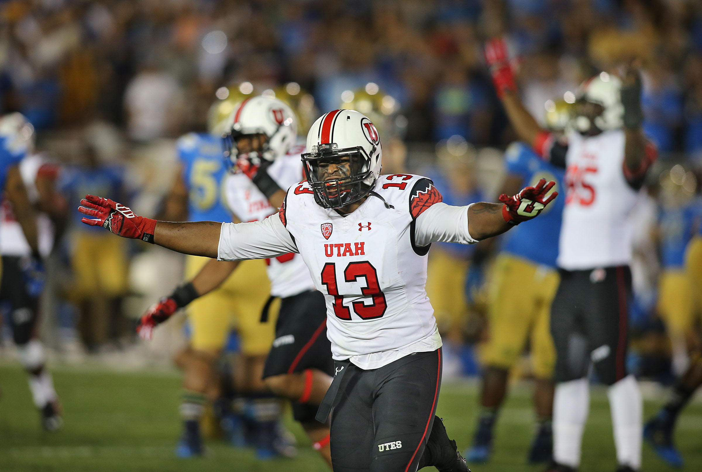 Utah Utes linebacker Gionni Paul (13) celebrates as the University of Utah defeats 8th ranked UCLA 30-28 in the Rose Bowl during NCAA PAC 12 football action Saturday, Oct. 4, 2014, in Pasadena. (Photo: Tom Smart/Deseret News)