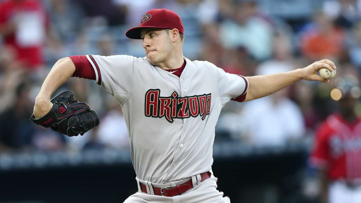 Corbin allows only 3 hits, Diamondbacks hold off Braves 8-4
