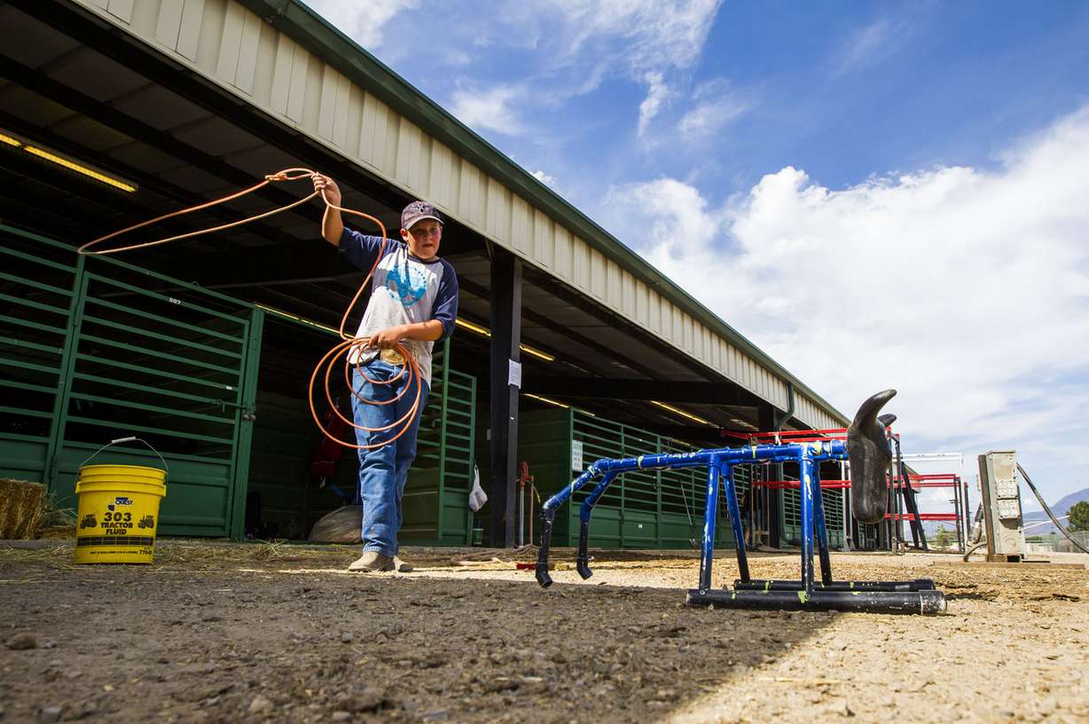 Cameron Simmons, 12, practices calf roping during the Salt Lake County Fair in South Jordan on Saturday, Aug. 15, 2015. (Photo: Stacie Scott, Deseret News)