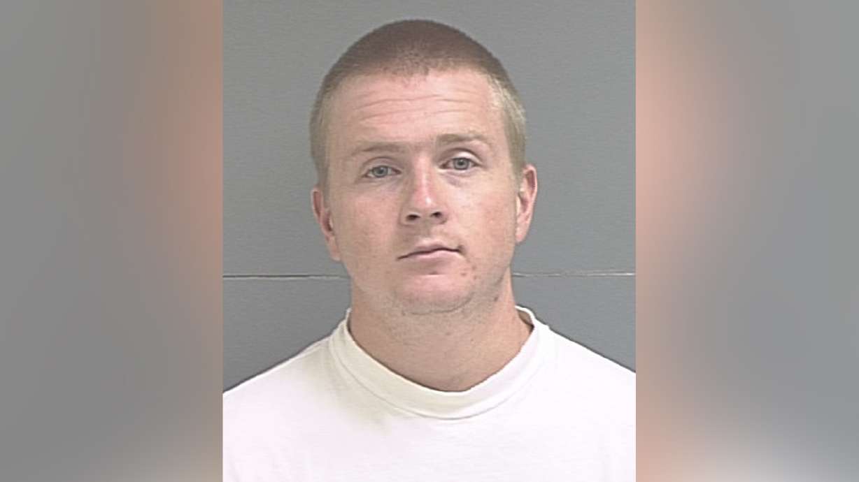 Warrant: Officer fired 3 times as motorcyclist shot himself