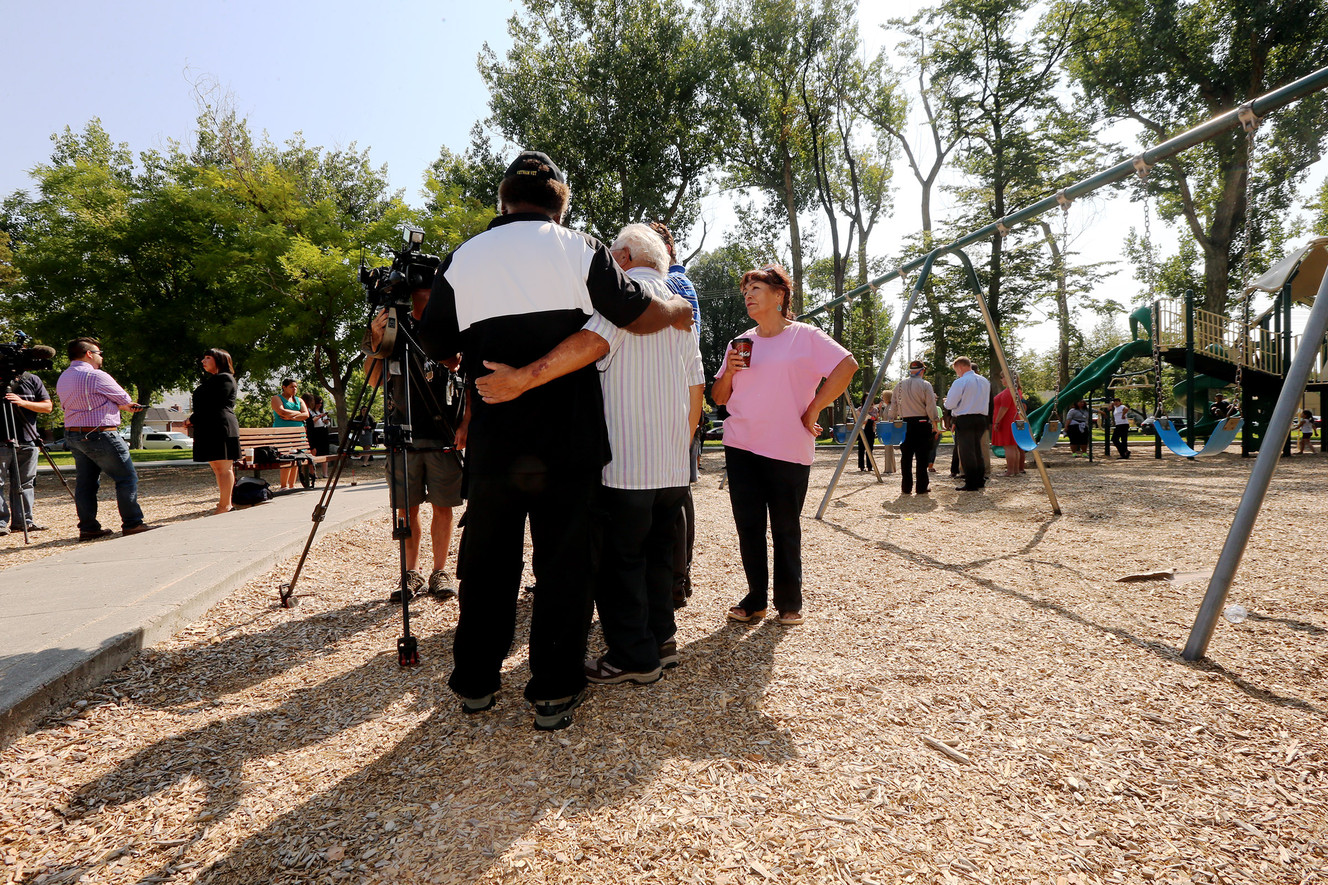 Archie Archuleta and G. Ernest Hughes speak with media as local and state leaders along with community members gather Monday, Aug. 17, 2015, at Riverside Park in Salt Lake City, to voice their disapproval of the Utah State Prison being moved to the west side of Salt Lake City. (Photo: Scott G Winterton, Deseret News)