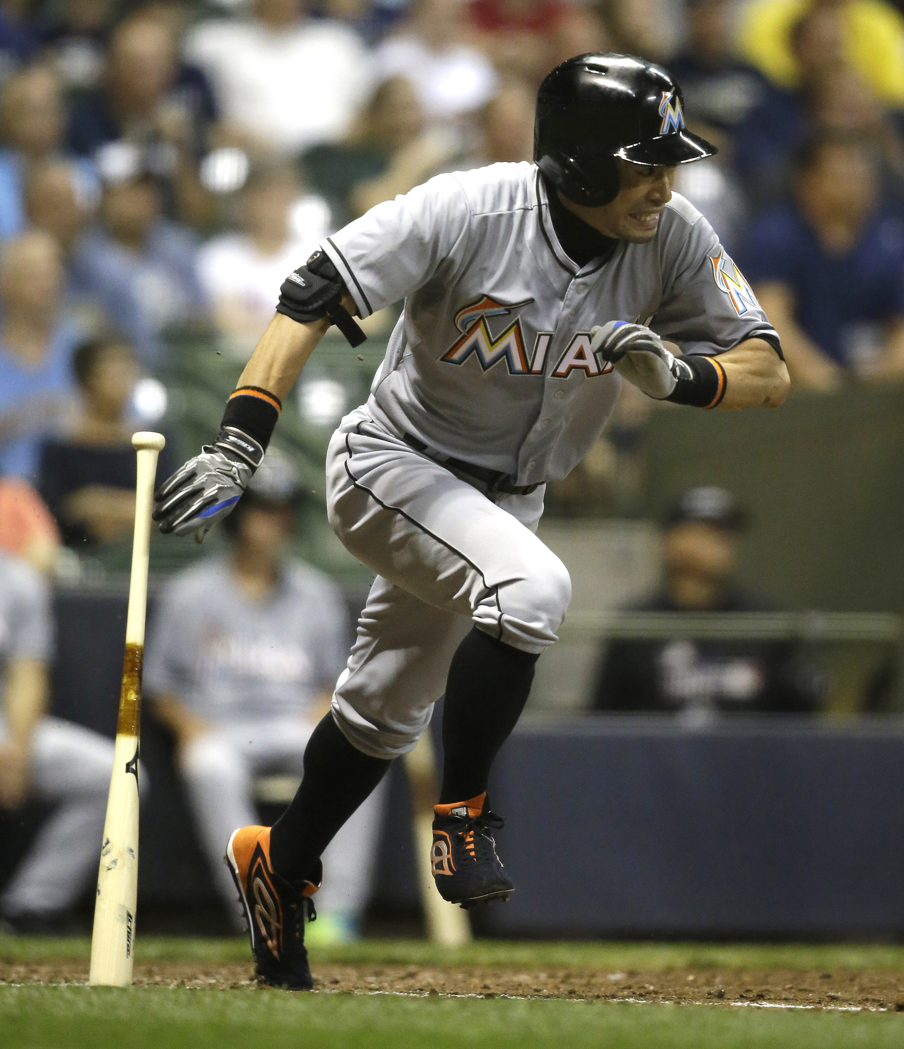 Suzuki's 4 hits lift Marlins past Brewers 9-6