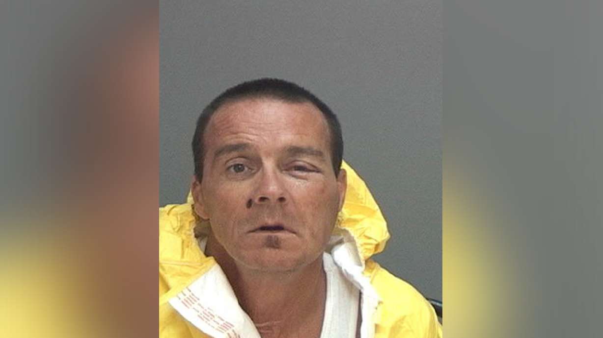 Man shot by officer released from hospital, booked into jail