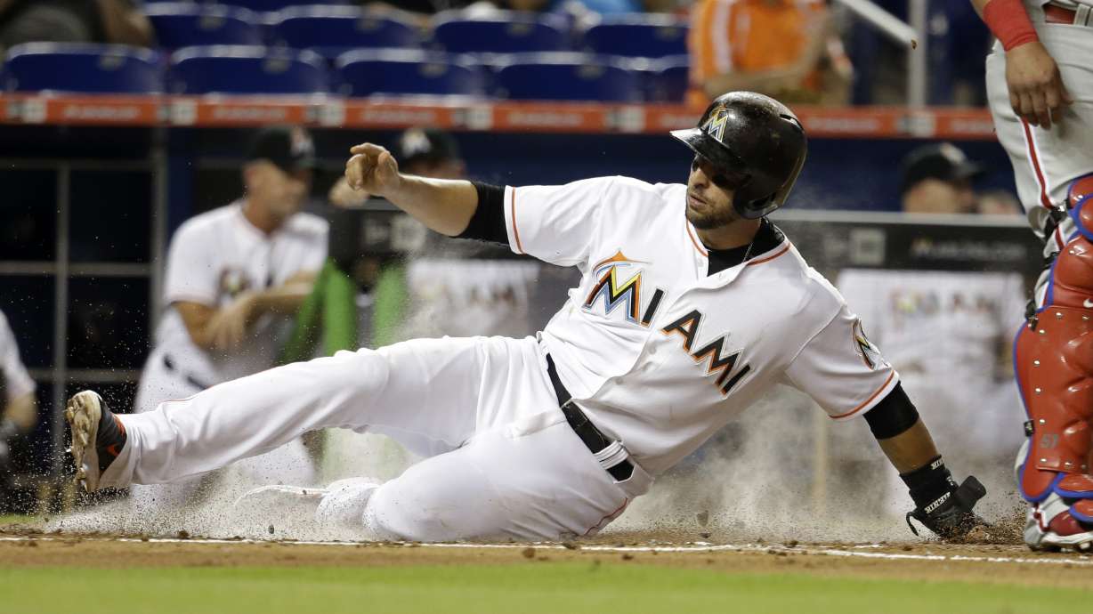 Ozuna, Prado power Marlins to 9-7 win over Phillies