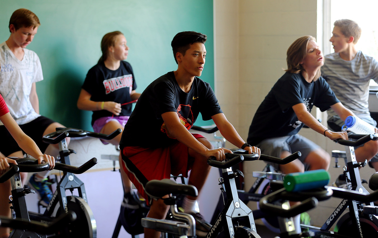 Senior Matt Shiramizu and other cross-country runners at Judge Memorial Catholic High School work out Friday, Aug. 21, 2015, inside after missing a meet due to bad air quality. (Photo: Scott G Winterton, Deseret News)