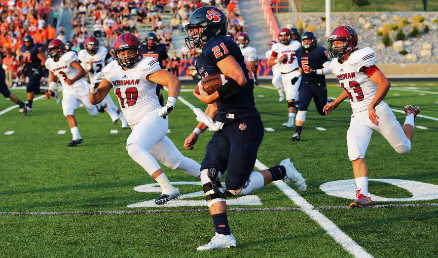 Brighton quarterback Drew Jensen runs for a first day on a fake punt during the Bengals' 23-14 win over Herriman on Friday, Aug. 21, 2015, at Brighton. (Photo: Scott G Winterton/Deseret News)