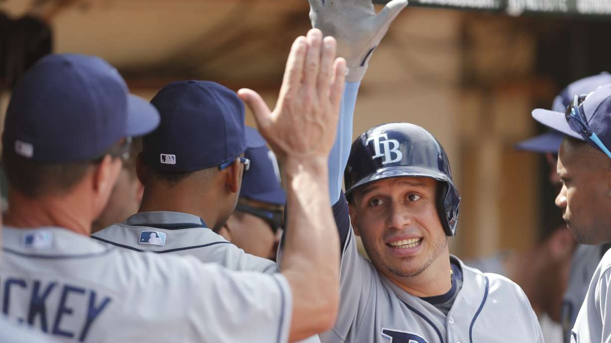 A's score 7 in seventh to beat Rays 8-2