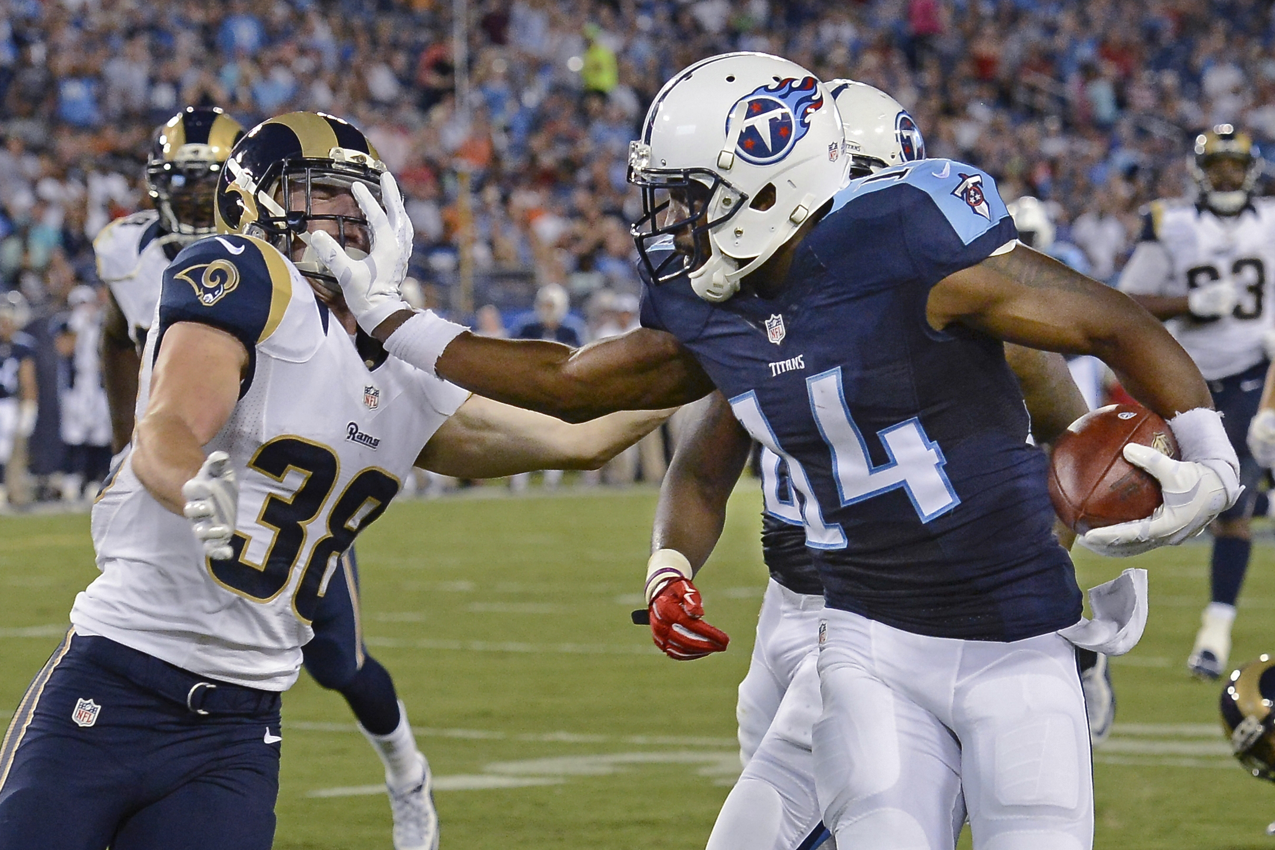 Titans beat Rams 27-14, spoiling coach Jeff Fisher's return