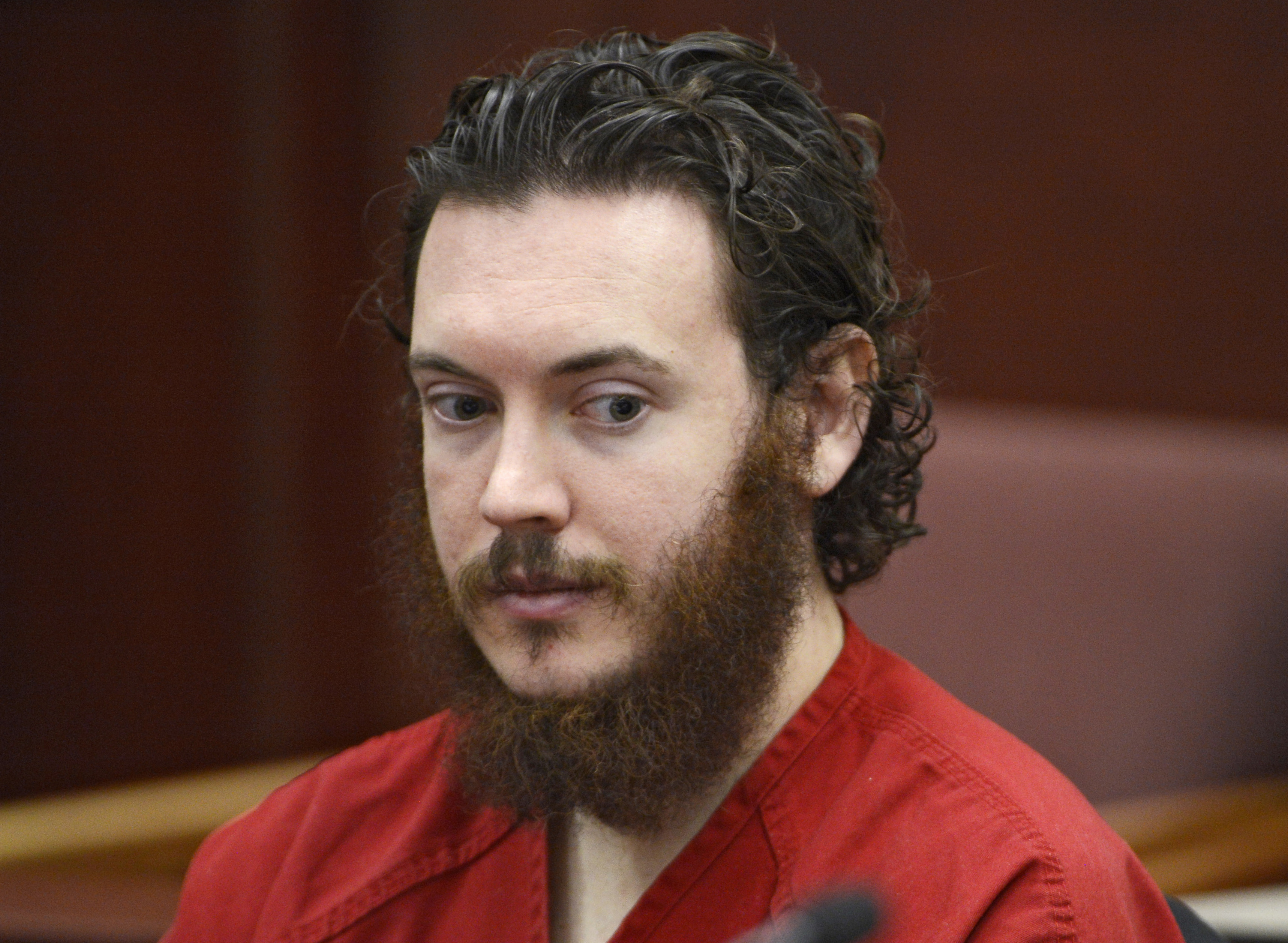 Theater victim's granddad questions motive of holdout juror