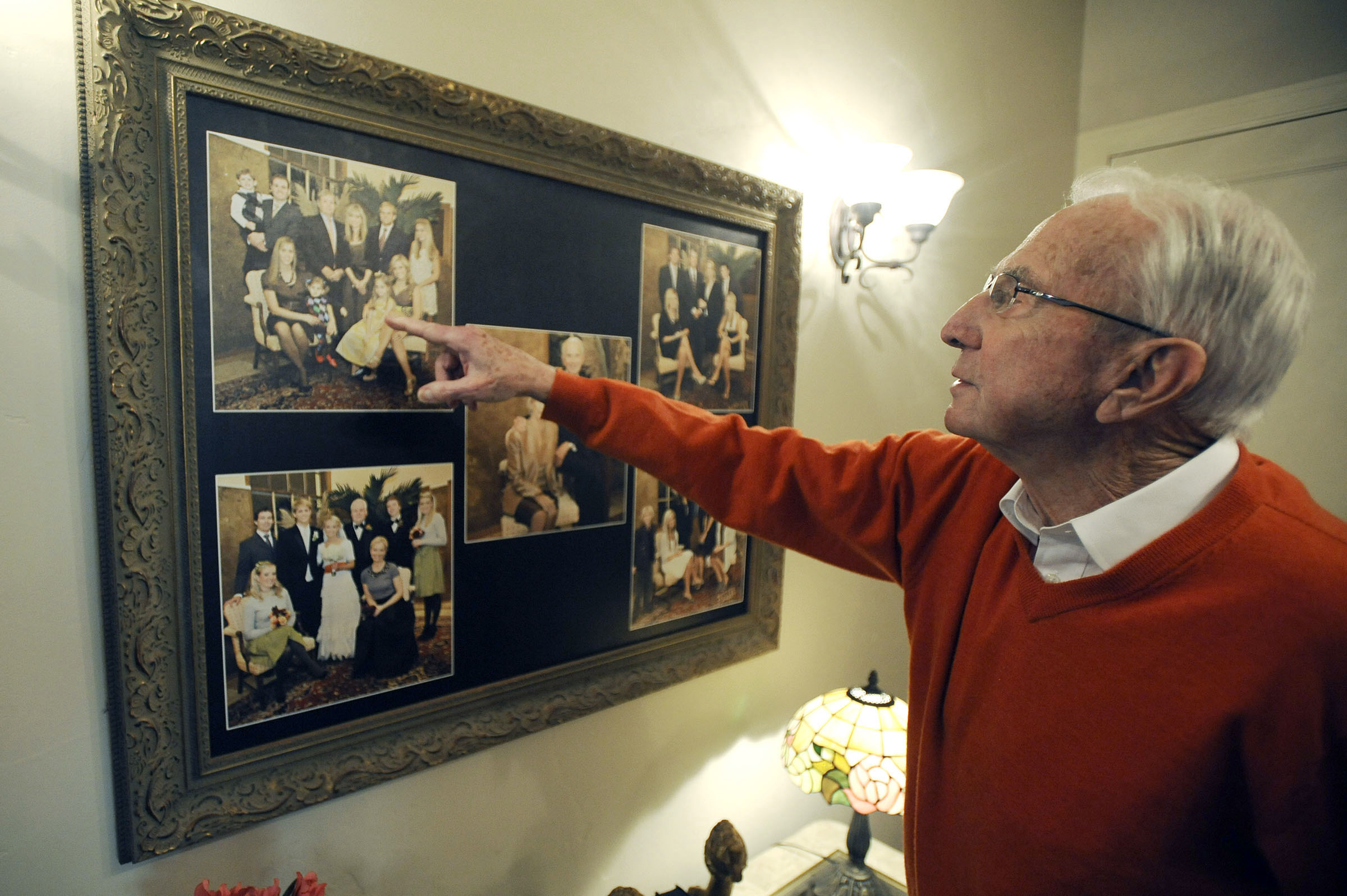 Fred Ball shows off one of his proudest his accomplishments, his family, in his home on Friday, March 14, 2014. (Photo: Matt Gade/Deseret News)