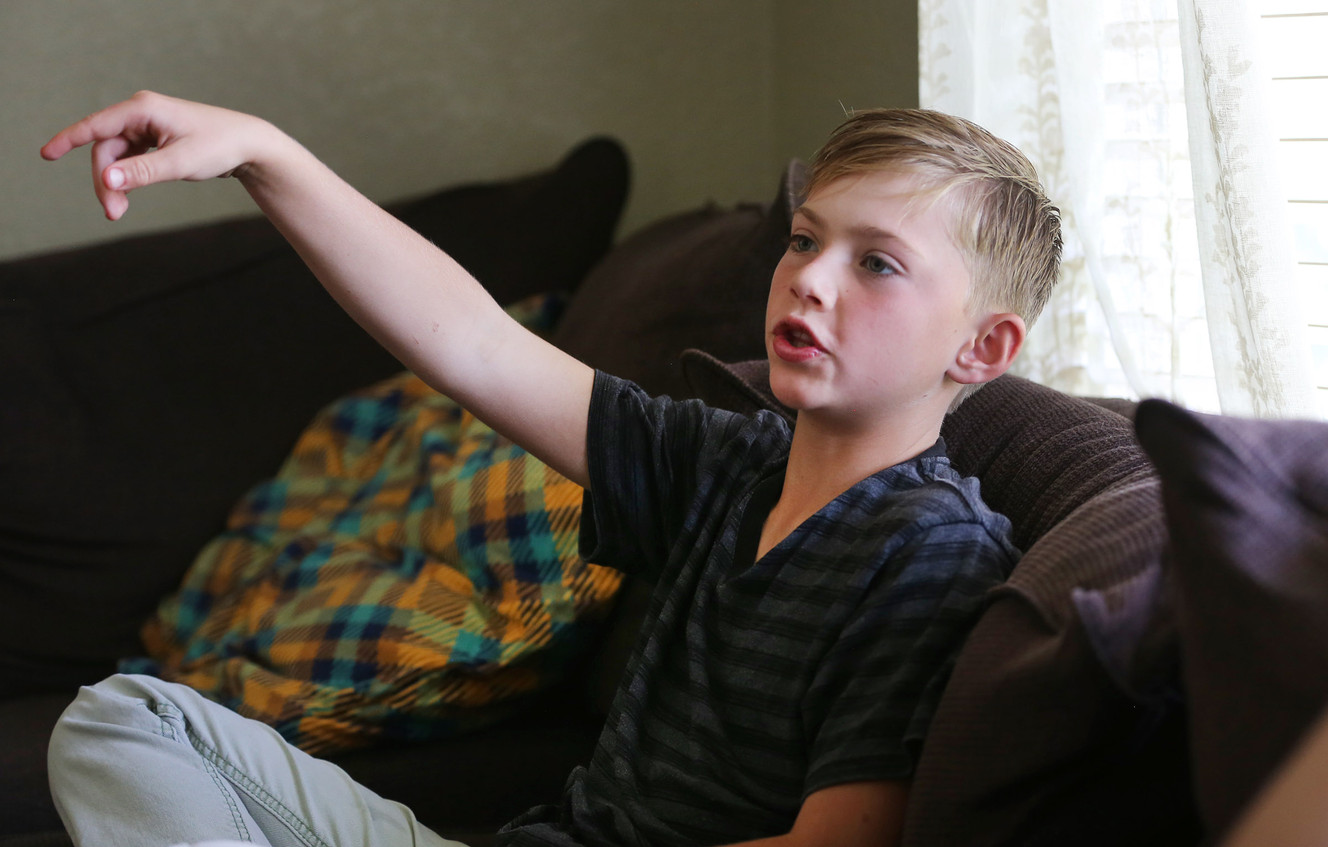 Malachi Bradley talks Tuesday, Aug. 25, 2015, about what he went through while lost in the Uinta Mountains while on a camping trip with his father and two other siblings. (Photo: Scott G Winterton, Deseret News)